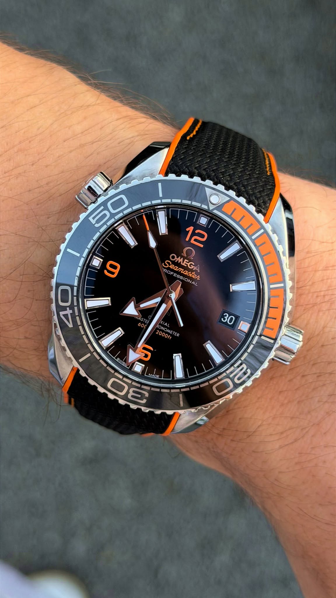 May be an image of wrist watch and text