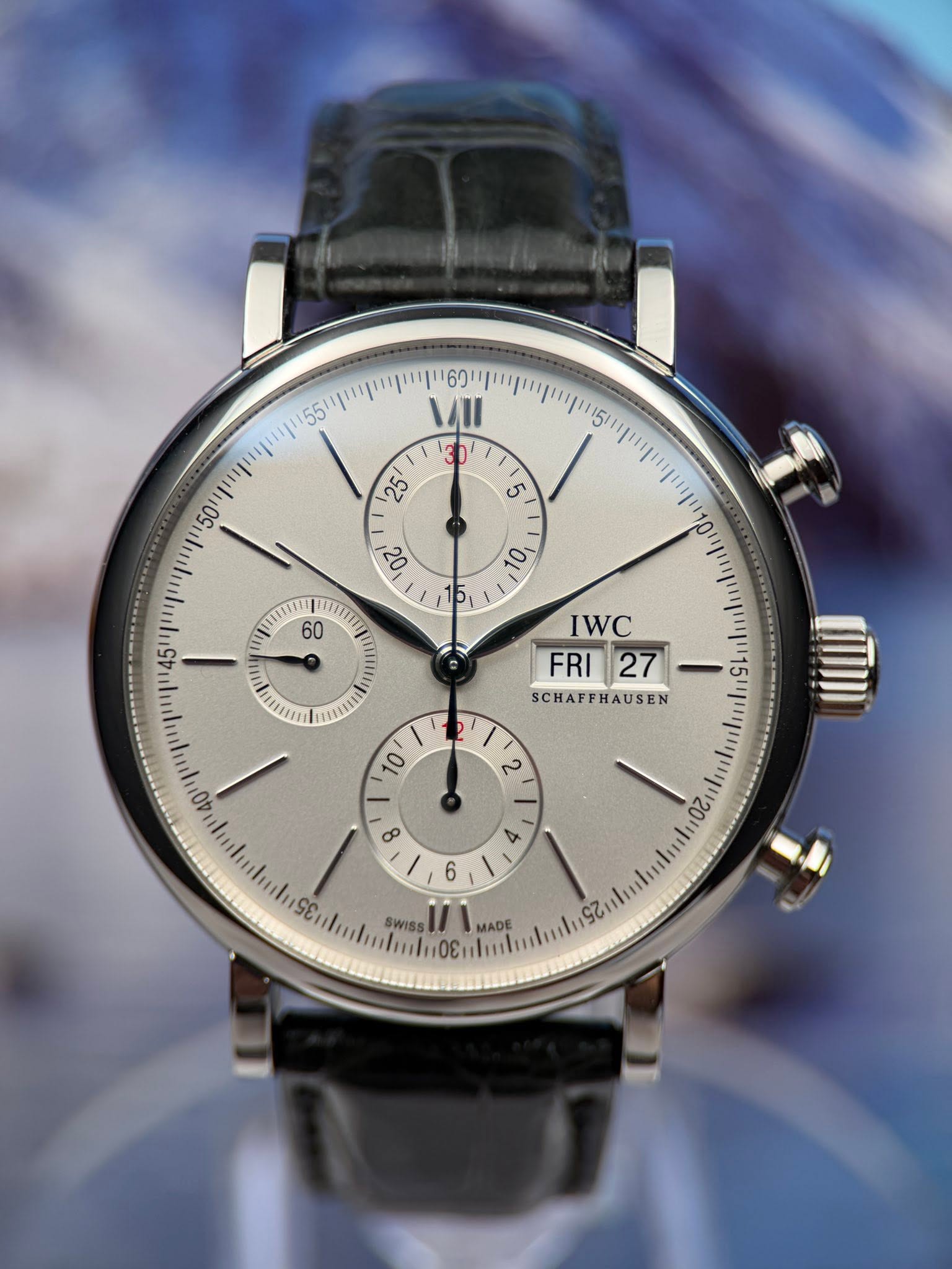 May be an image of wrist watch and text that says 'יויי 55 פטייזיייםייחייויי5ת יפי VII T mEU IWC FRI FRI27 27 SCHAFFHAUSEN SCHAFFI 10 2 8 8 / و 4 + / SWISS nS ADE'