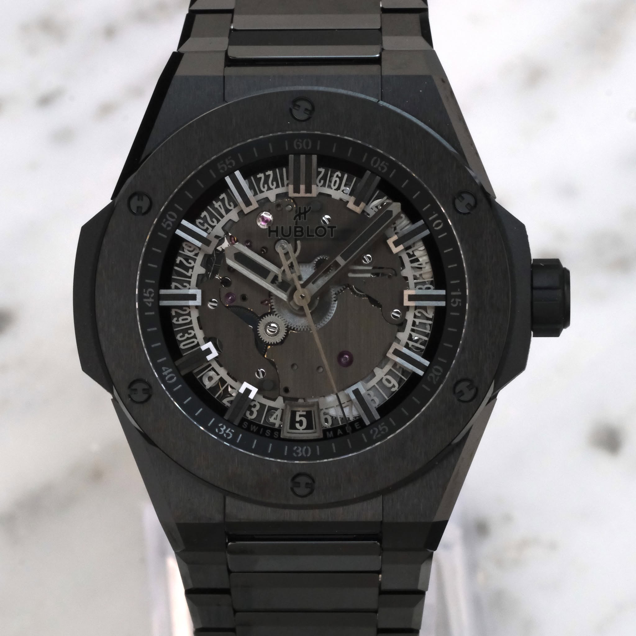May be an image of wrist watch and text