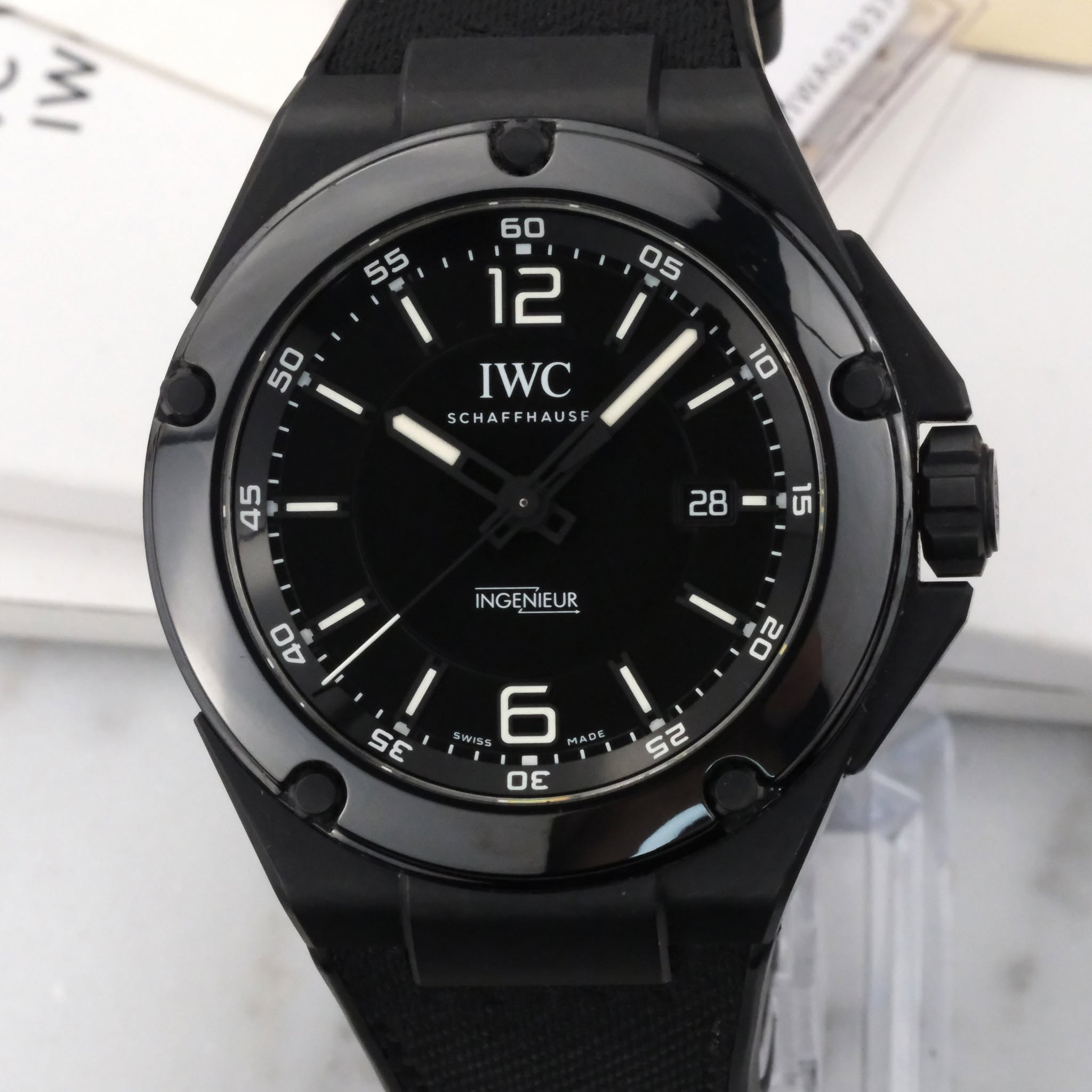 May be an image of digital watch and text that says 'MI IWC SCHAFFHAUSF 10 45 28-ី ហ 28 INGENIEUR 40 กม TU 5 WIS5 6 MAD Οε S2'