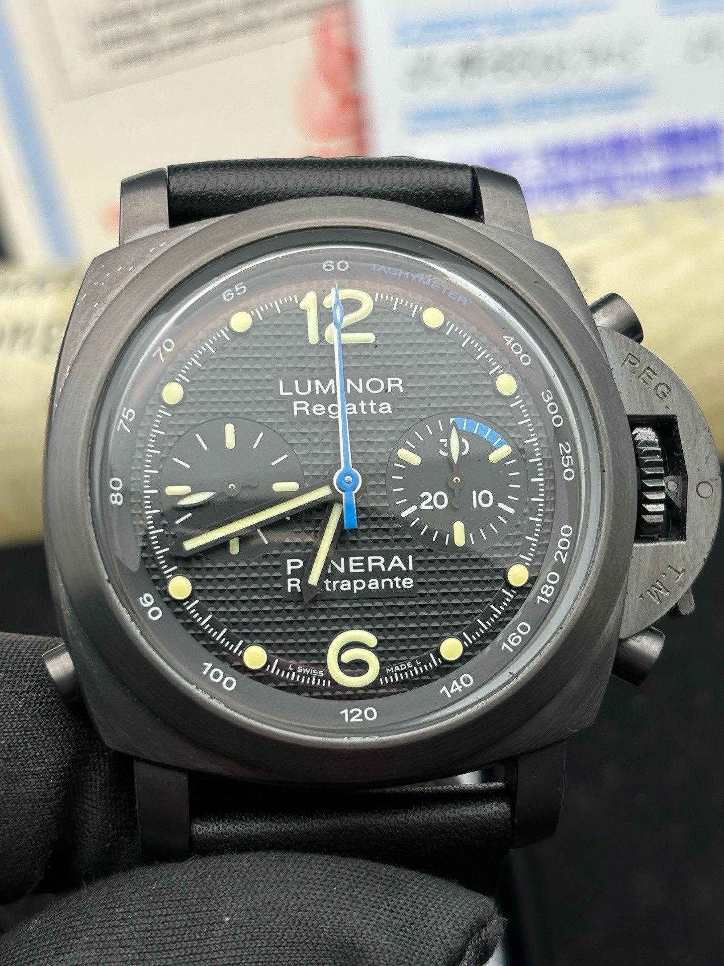 May be an image of wrist watch and text