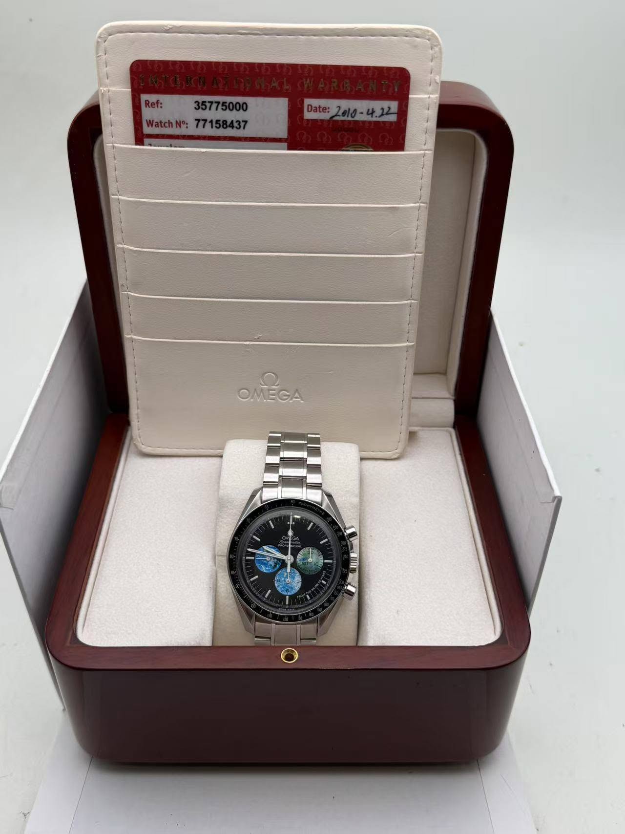 May be an image of wrist watch and text that says 'Ref: 35775000 WatchN:77158437 WatchN: 77158437 Date: Date: 4 OMEGA OMEGA'