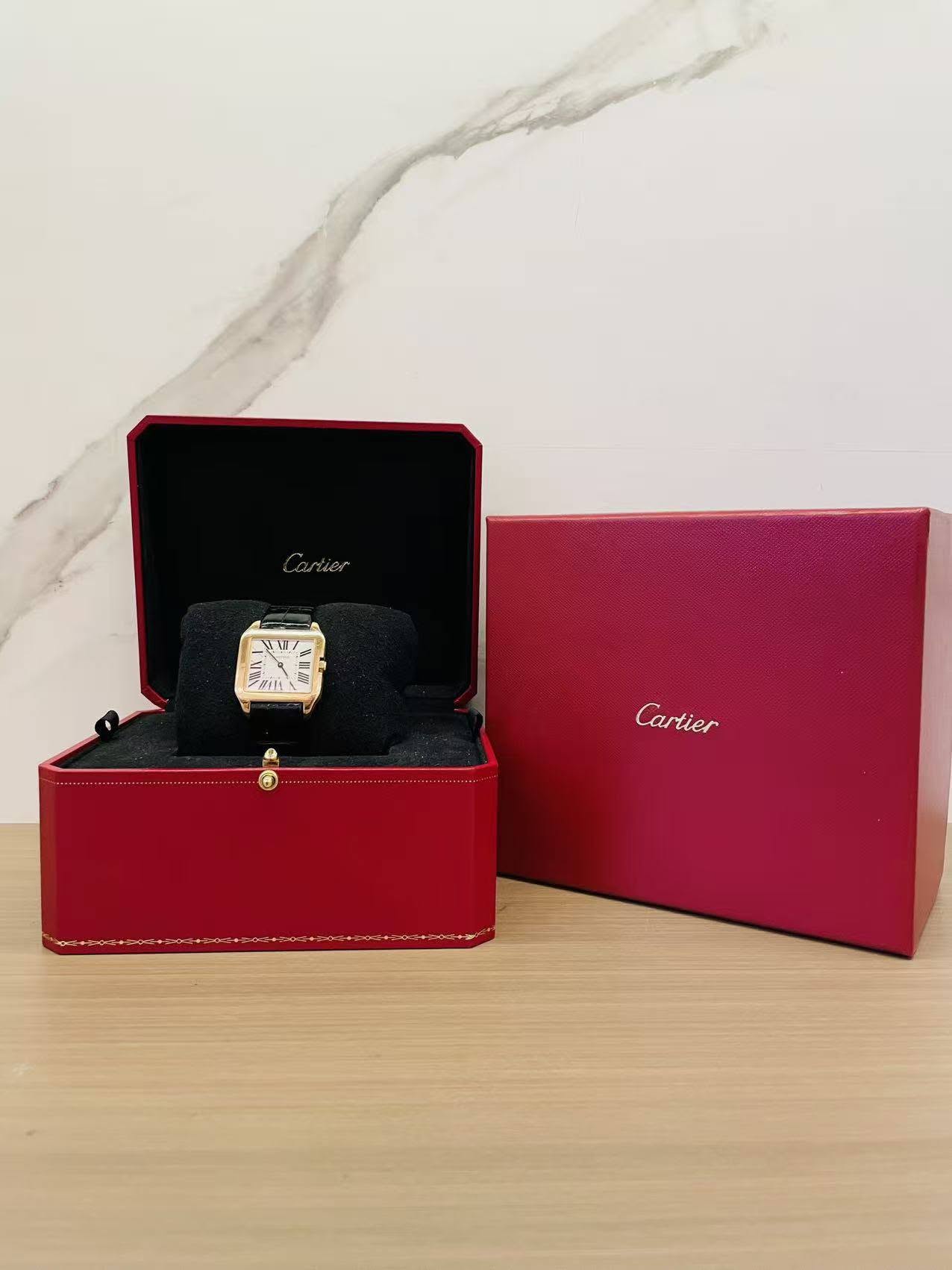 May be an image of owl and text that says 'artier NWI - #IRA هد 0 Cartier'