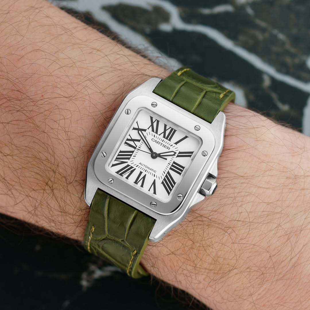 May be an image of leather, digital watch and text