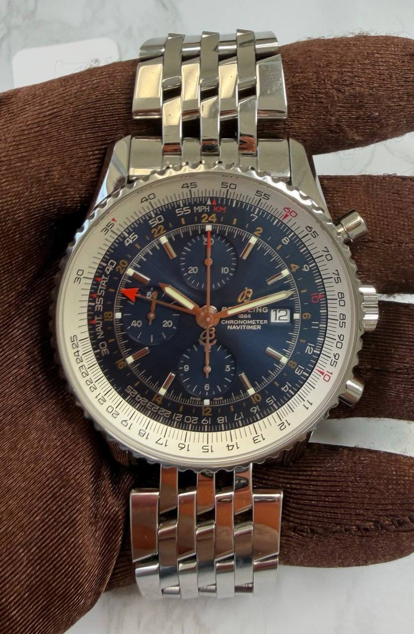 May be an image of wrist watch and text that says '55 40 35 CIa 50 45 م NG 12 ONOME TER NAVITIMER E bi SI Ει טם'