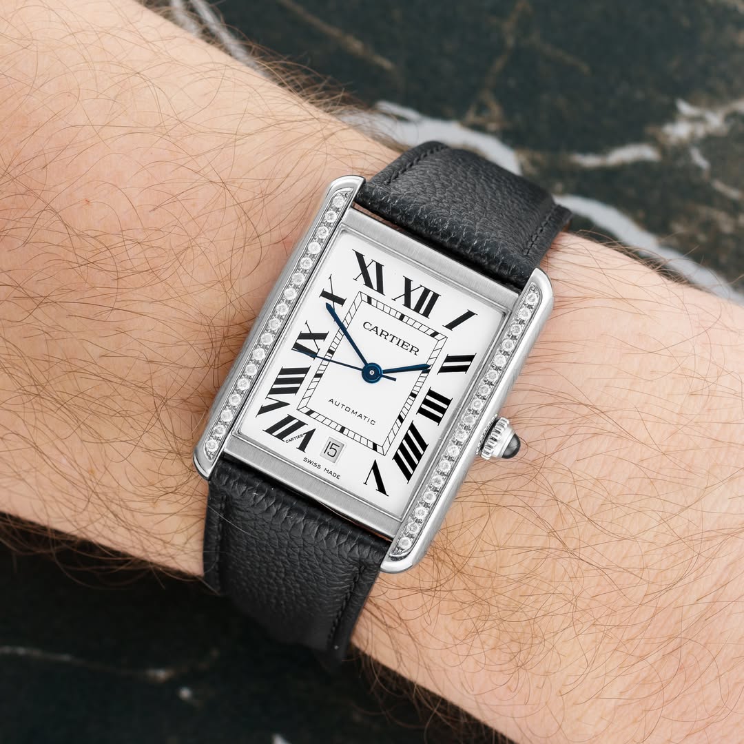 May be an image of wrist watch