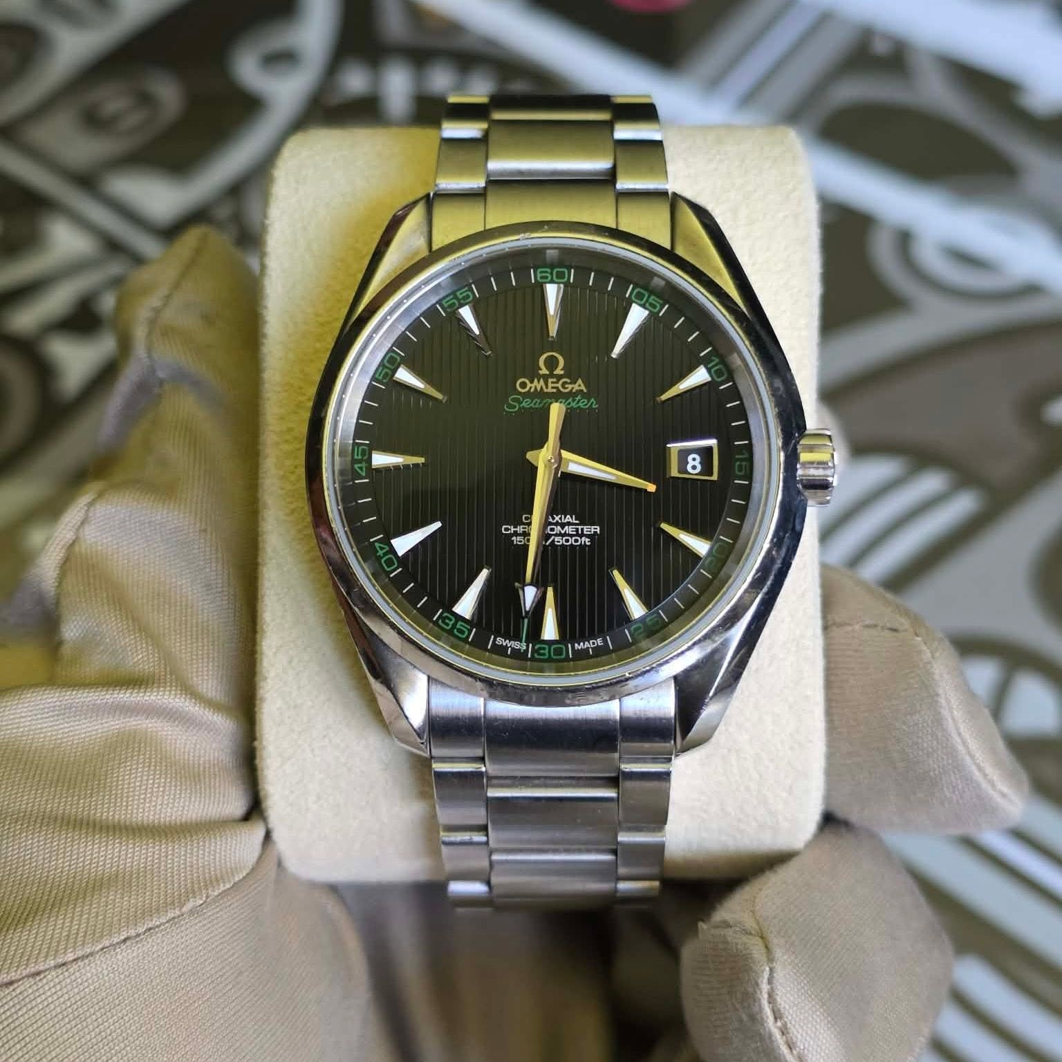 May be an image of wrist watch and text