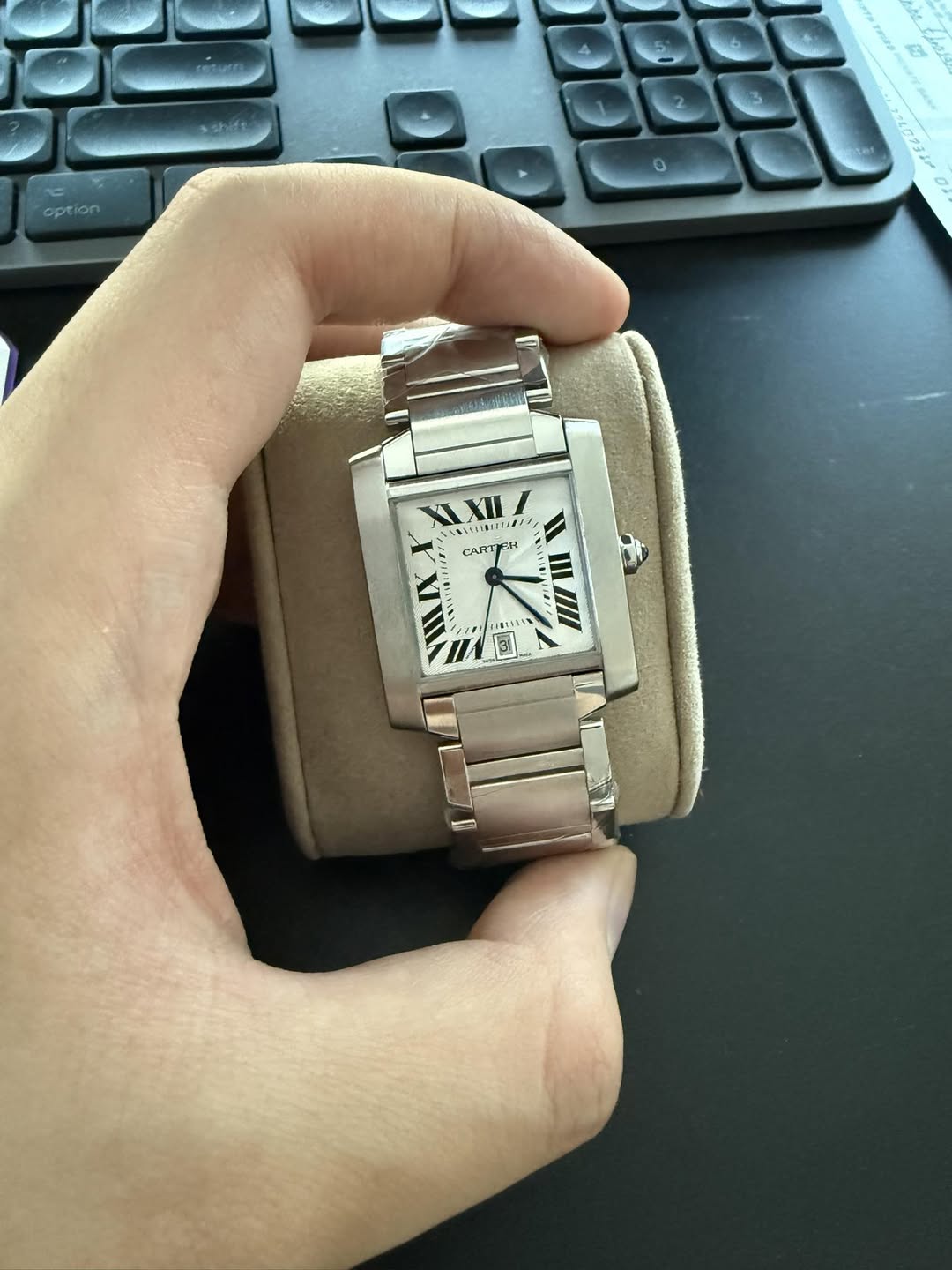 May be an image of digital watch and text