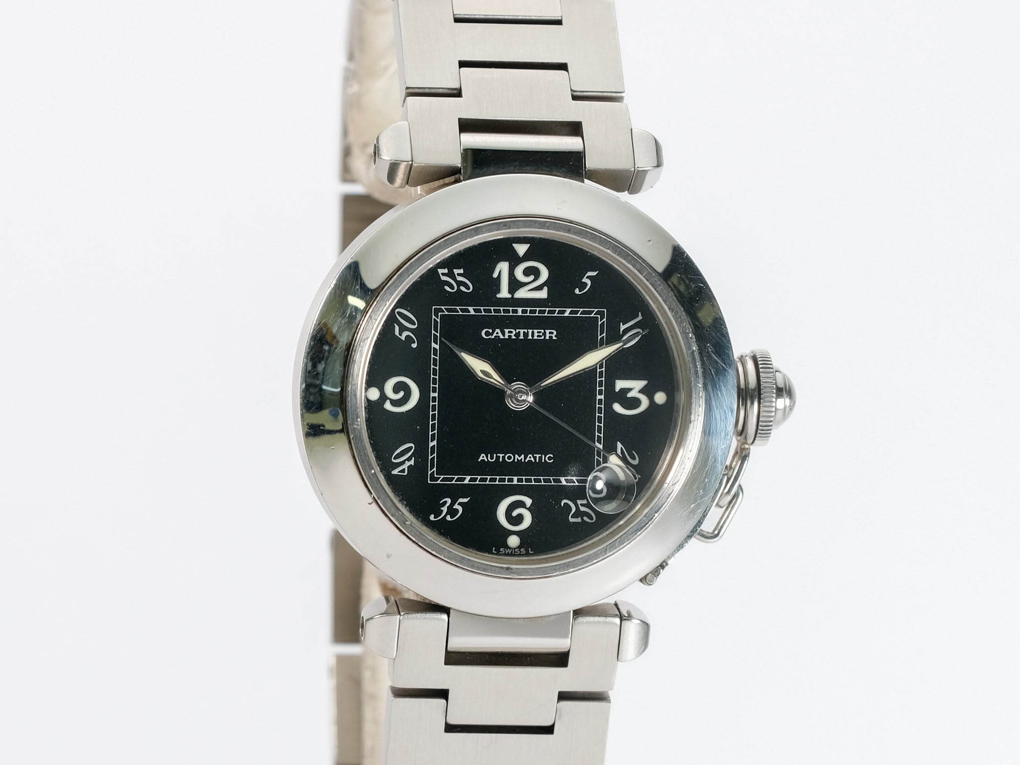 May be an image of wrist watch and text
