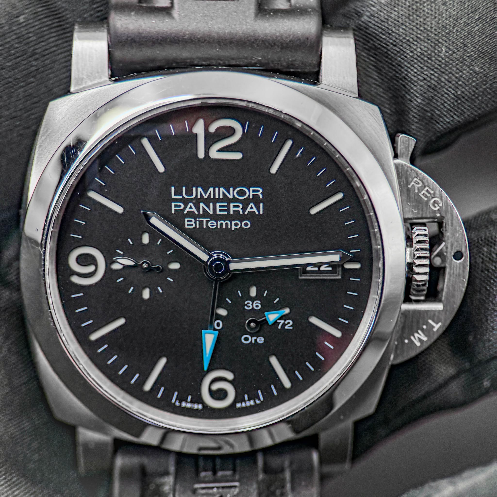 May be an image of wrist watch and text