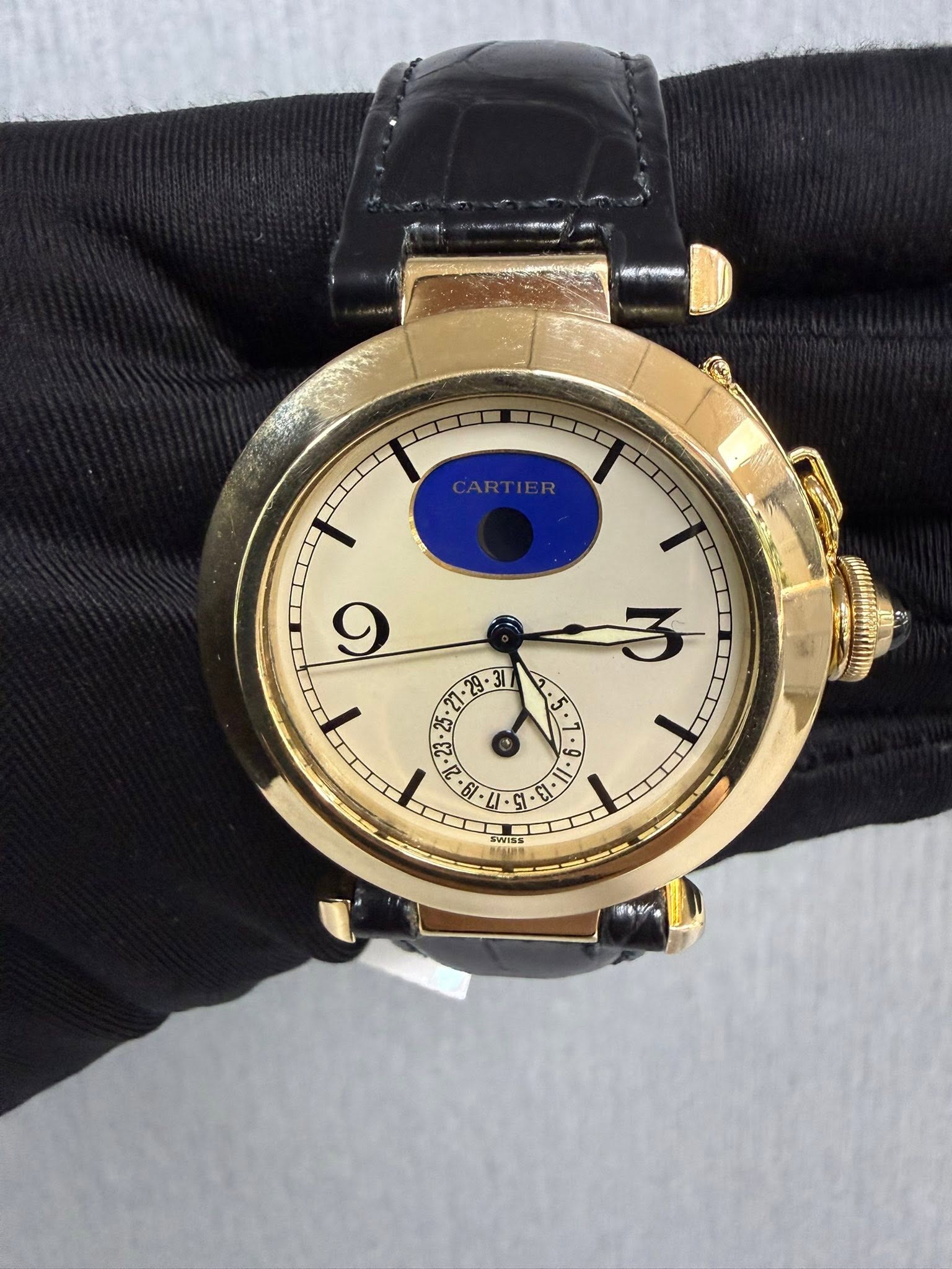 May be an image of wrist watch and text