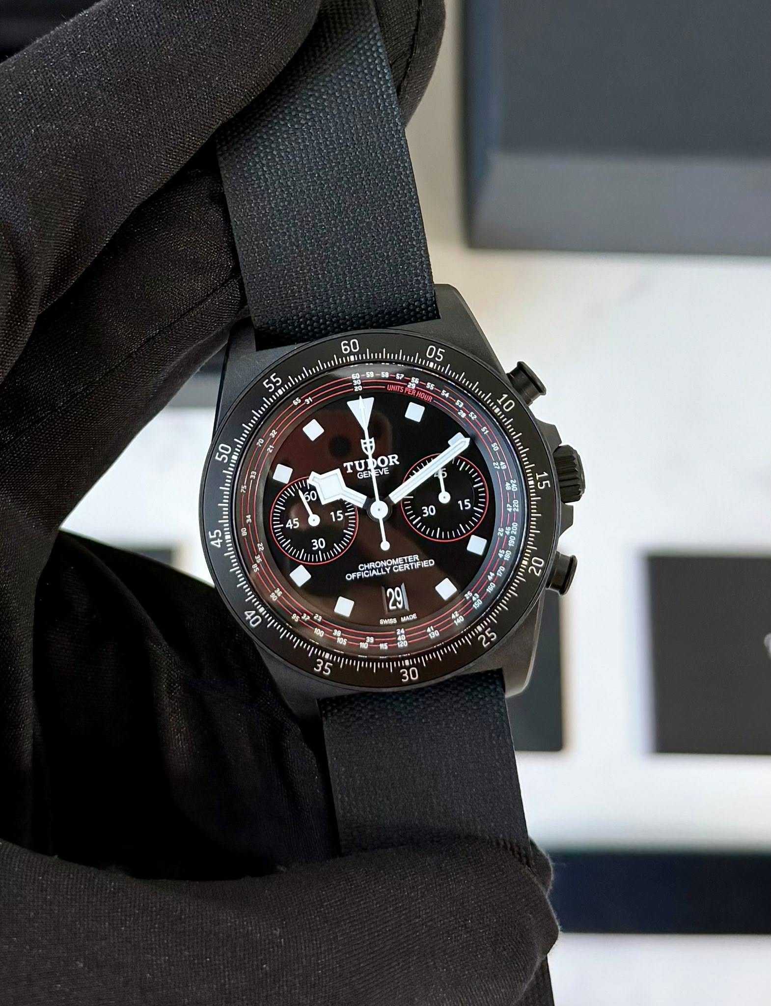May be an image of wrist watch and text