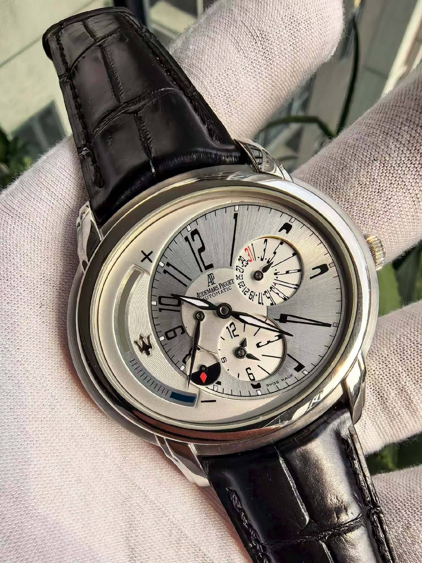 May be an image of wrist watch and text
