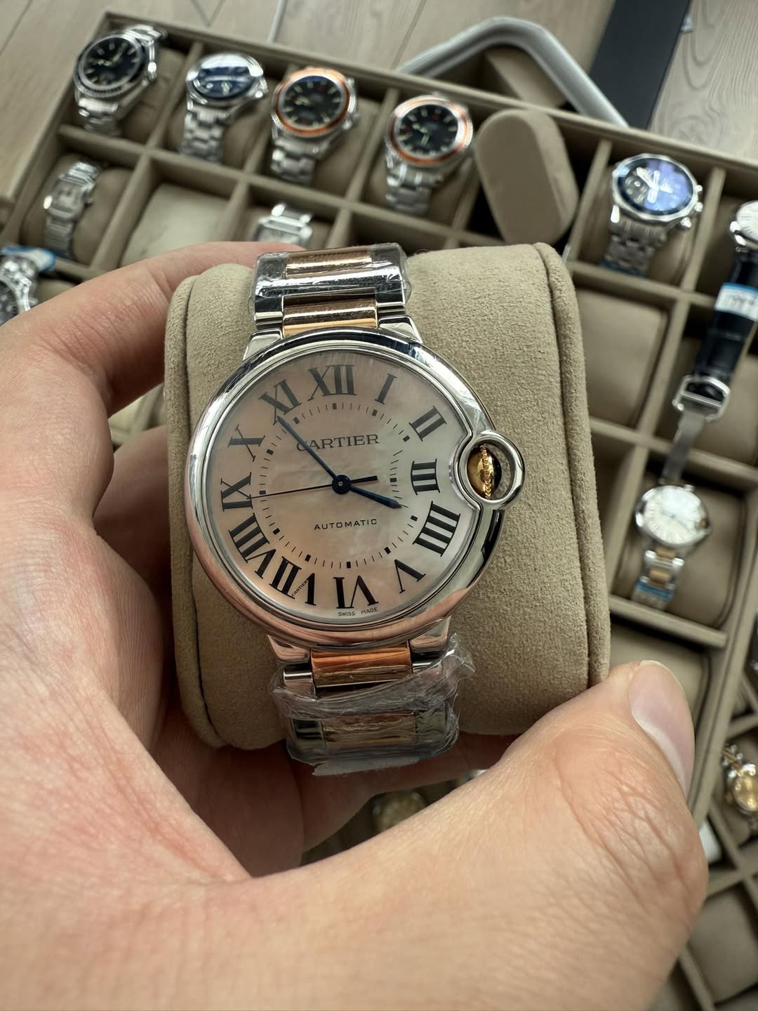 May be an image of wrist watch and text