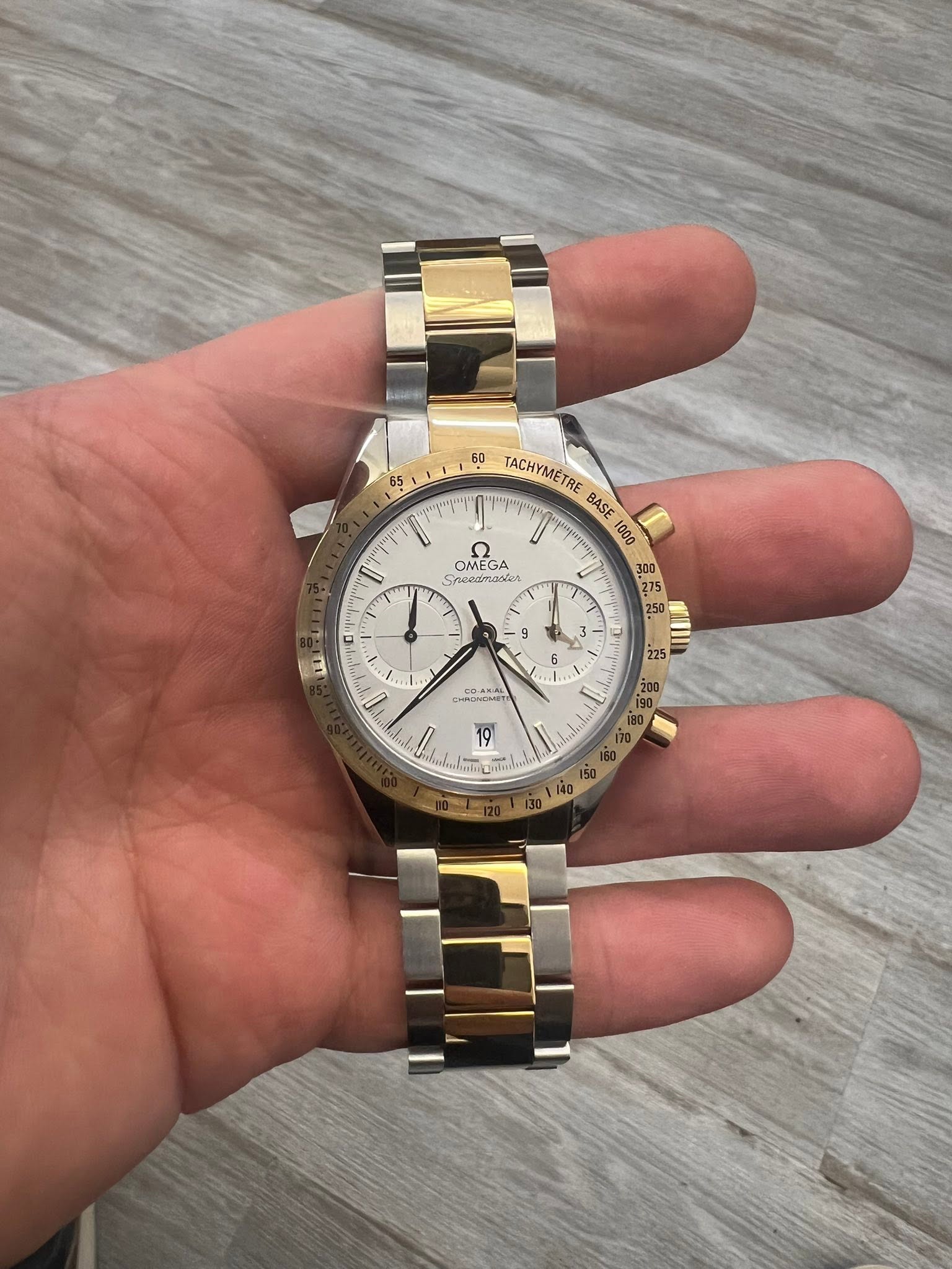 May be an image of wrist watch and text