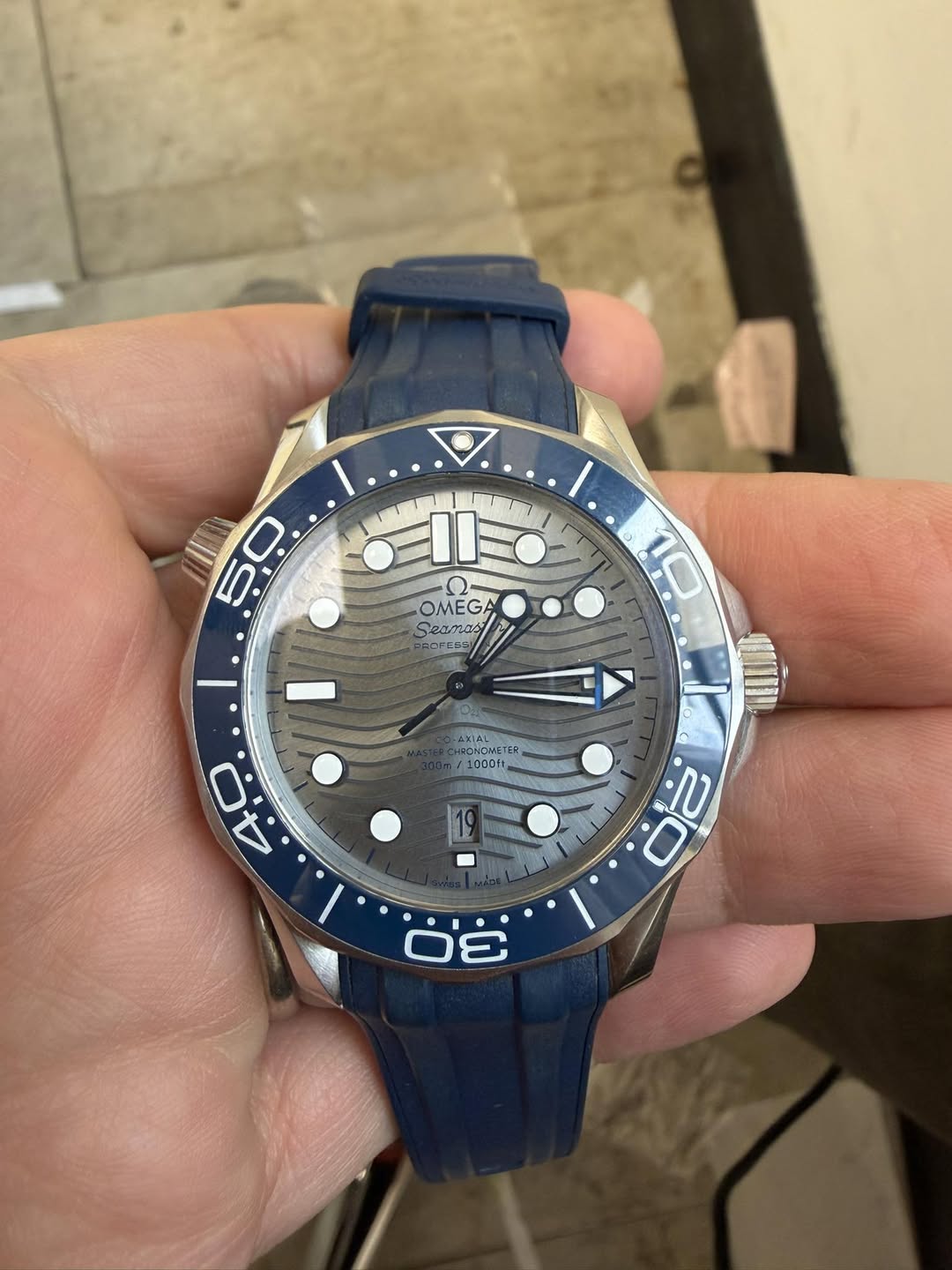 May be an image of wrist watch and text