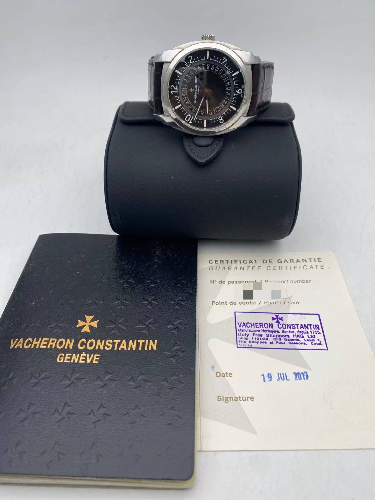 May be an image of wrist watch and text that says 'หรงภว 2i1! uis ካ 860 12 9 O 8 CERTIFICAT CERTIFICATDEGARANTIE DE GARANTIE GUARANTEE GUARANTEECERTIFICATE CERTIFICATE N° N'd…