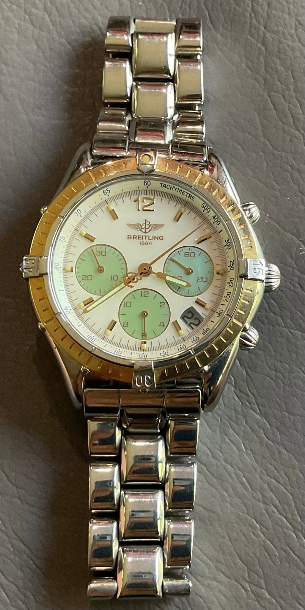 May be an image of wrist watch and text that says '65 70 60 TACHYMETRE I 30 BREITLING EITLI LING BR 0z 092 2 8 De 100 Gay A'