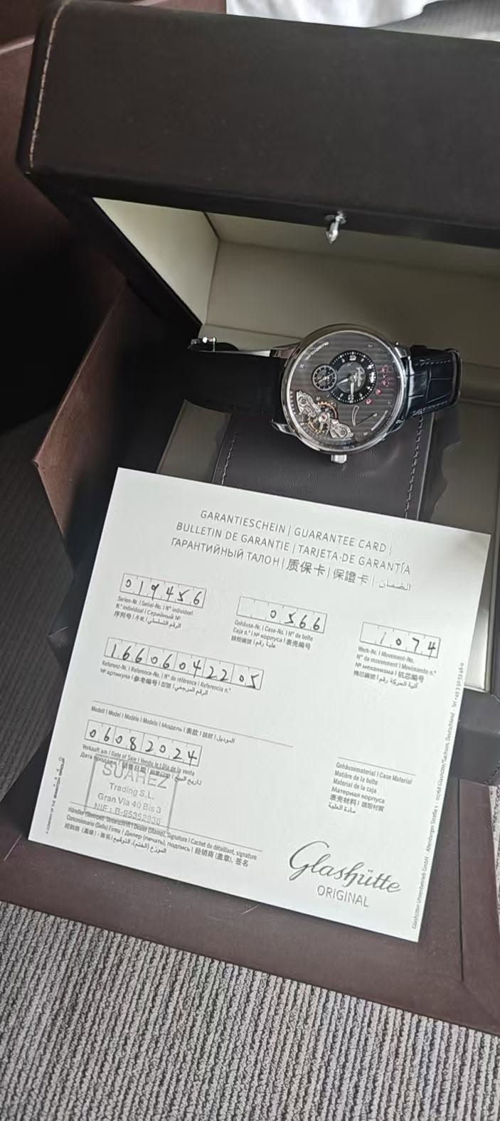 May be an image of wrist watch and text