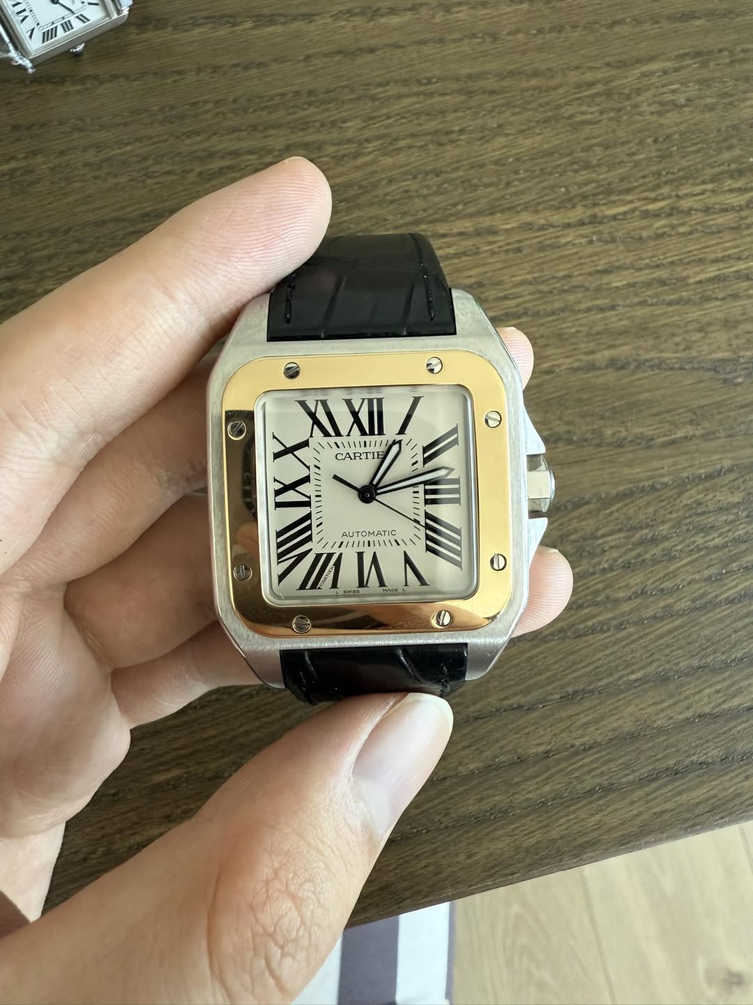 May be an image of digital watch and text