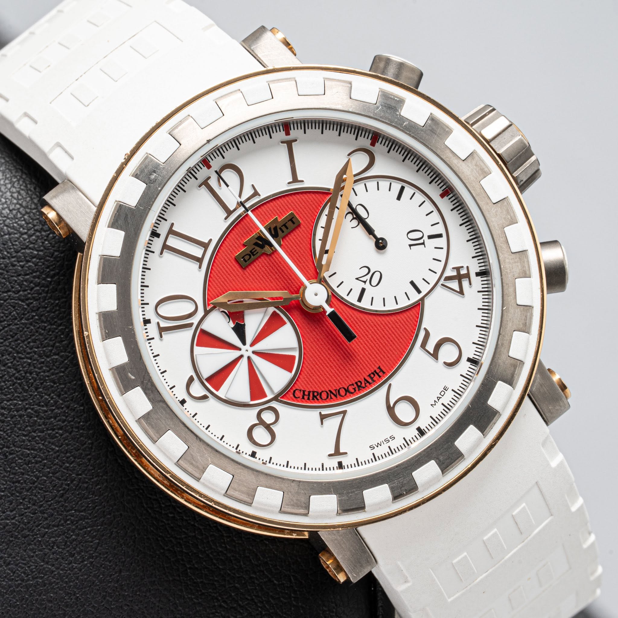 May be an image of wrist watch and text