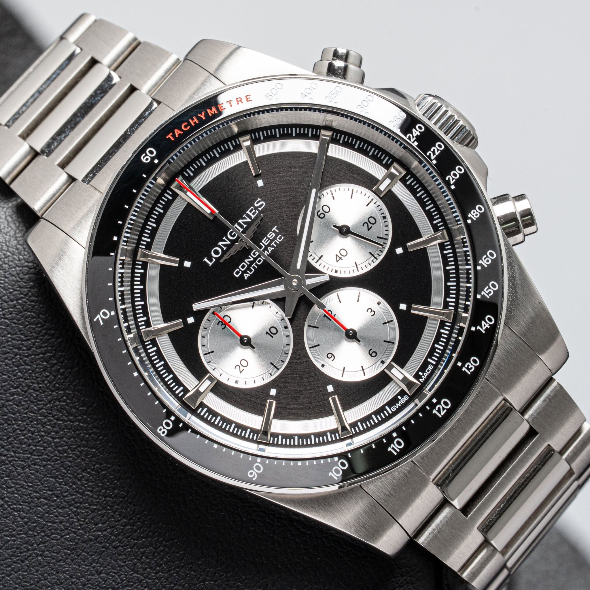 May be an image of wrist watch and text that says 'TRE 60 = รปรมย 40 L 200 'p' 60 J' t1 20 LONG AUTG LONGINES IA JEST ECT ATIC CONG 180 i1 40 O2 wrpp o 6 M 08 Iuslui 130 MADE SWGS…