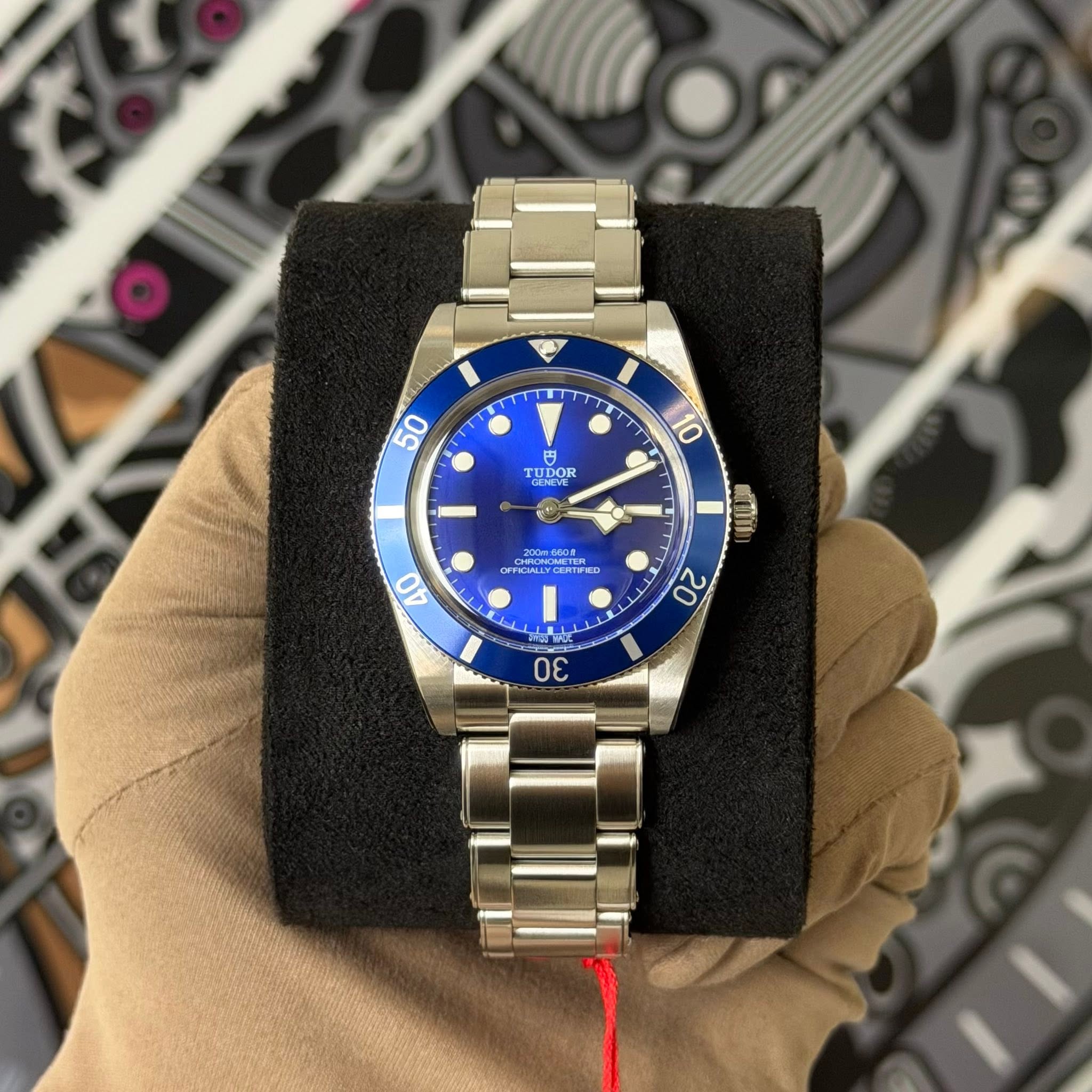 May be an image of wrist watch and text that says '50 CIDOR TUDOR و DOR OD DOR 10 40 ஜന്ന் 20 30'