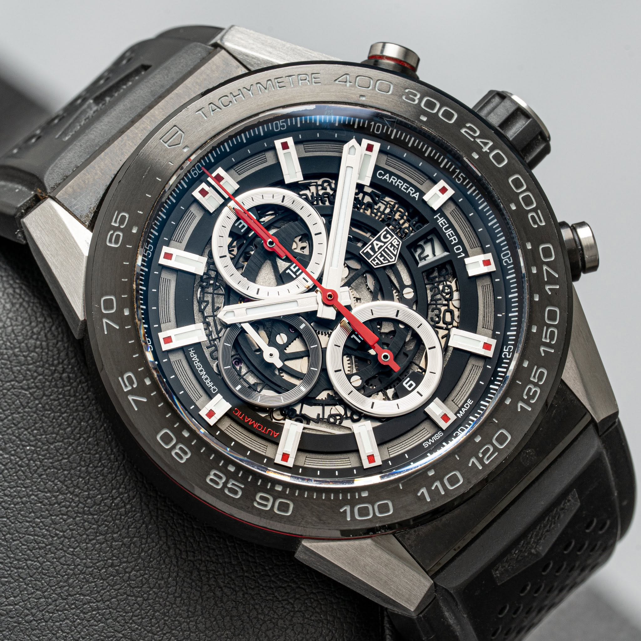 May be an image of digital watch and text that says 'L1 6 65 3 O CARRERA HEUE HEUERO H 70 2 TACHYMETRE 400 300 M 1 ਚ ADE ADE 135 SWISS 20 120 ノ二 00 N 70 O מאשמאאכועעח יישאועבי O…