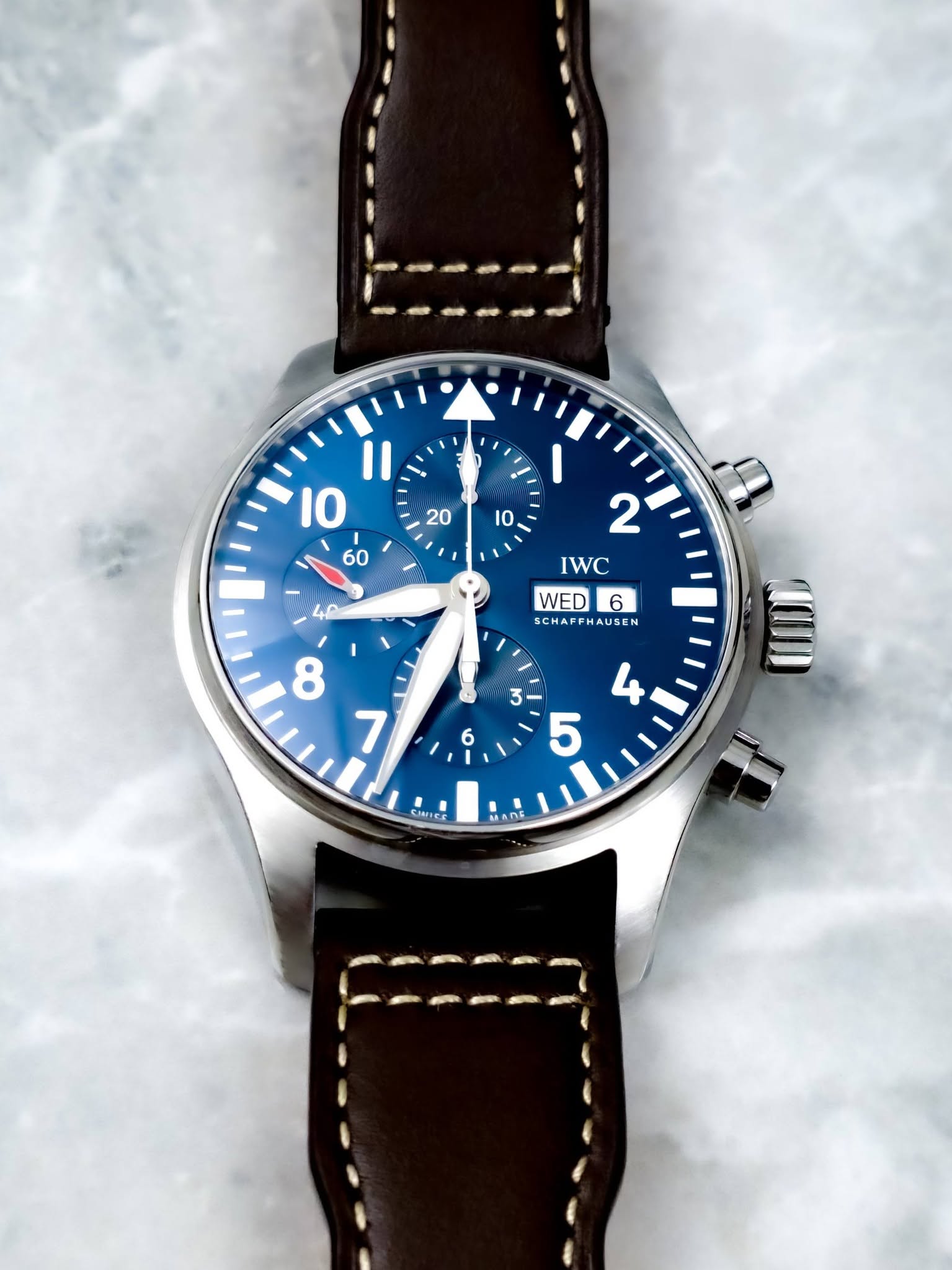 May be an image of wrist watch and text that says ' I 60 20 10 ' 2 IWC WED 6 SCHAFFHAUSEN FH ેરપ SCHAFF FHAUSEN SIMIEE IMECE BADF'