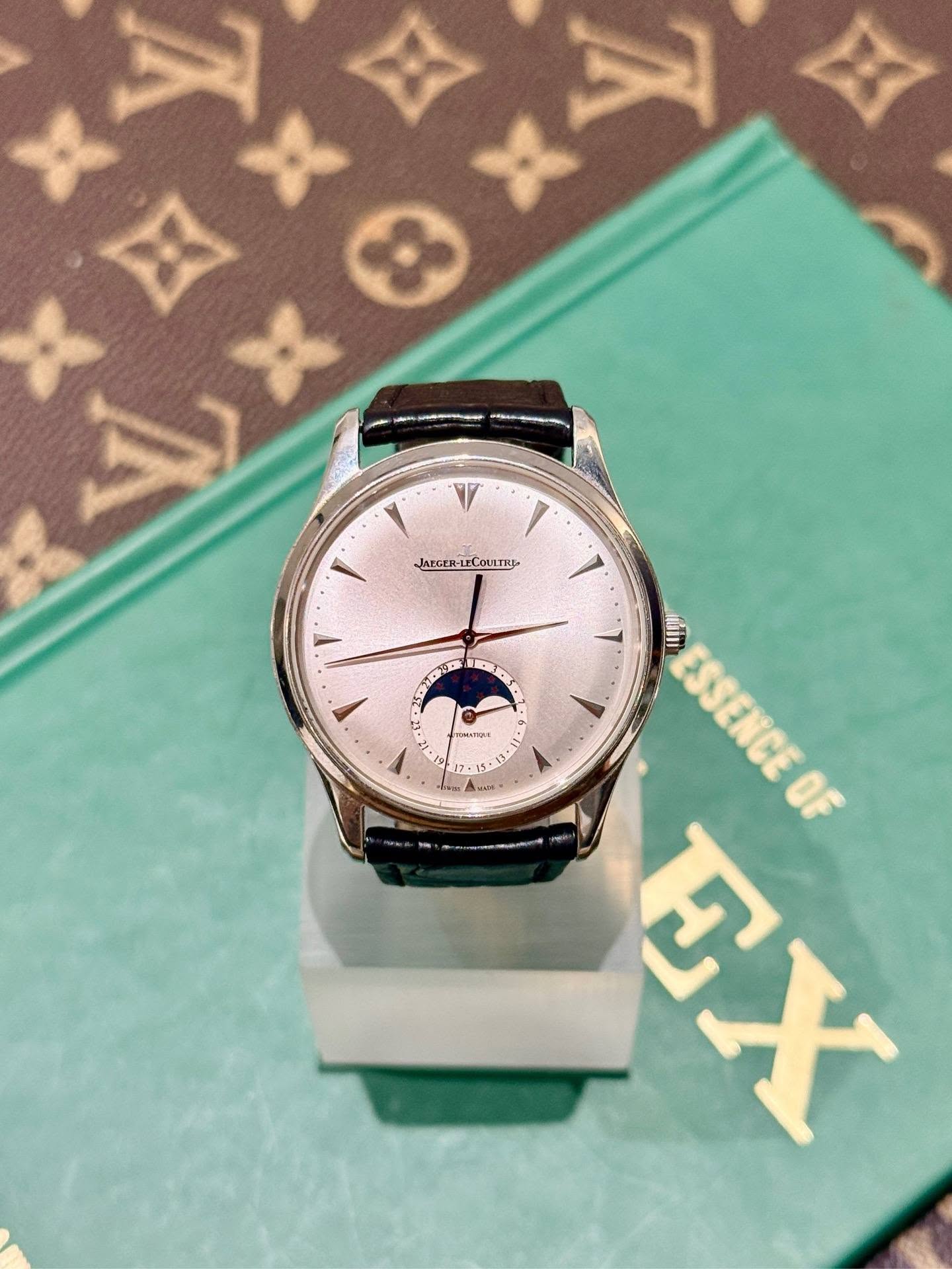 May be an image of wrist watch and text