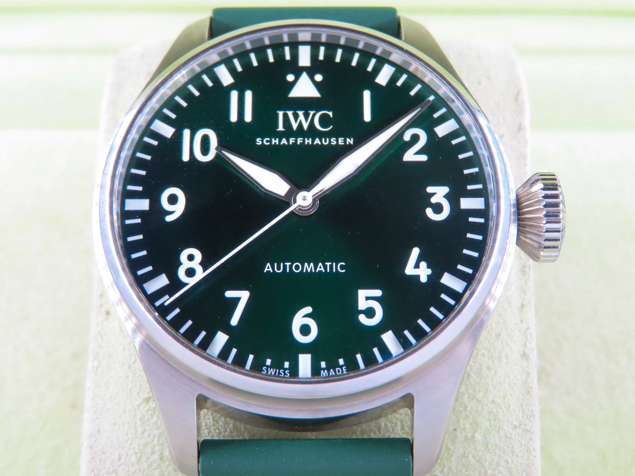 May be an image of wrist watch and text that says 'II 10 I IWC SCHAFFHAUSEN SWISS MADE'