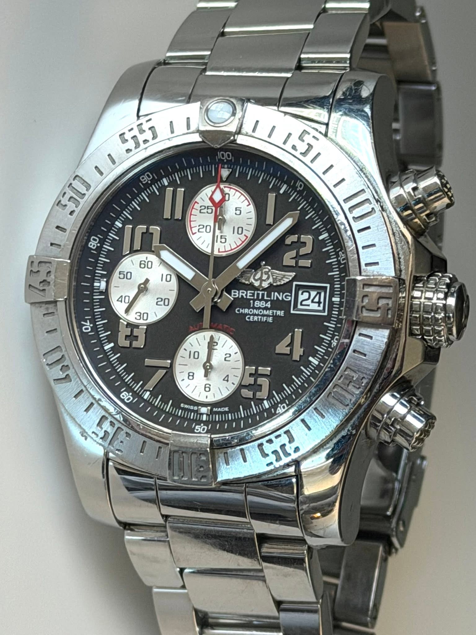 May be an image of wrist watch and text that says 'いい 25 5 80 II Ir l5 40 乾 7 כי f BREITL ING 24 SONDME CHRONOMET TRE CERTIFIE 2 2 4 4 F5 門言 C X 8 ه 6 SWISe ET MADE 8'