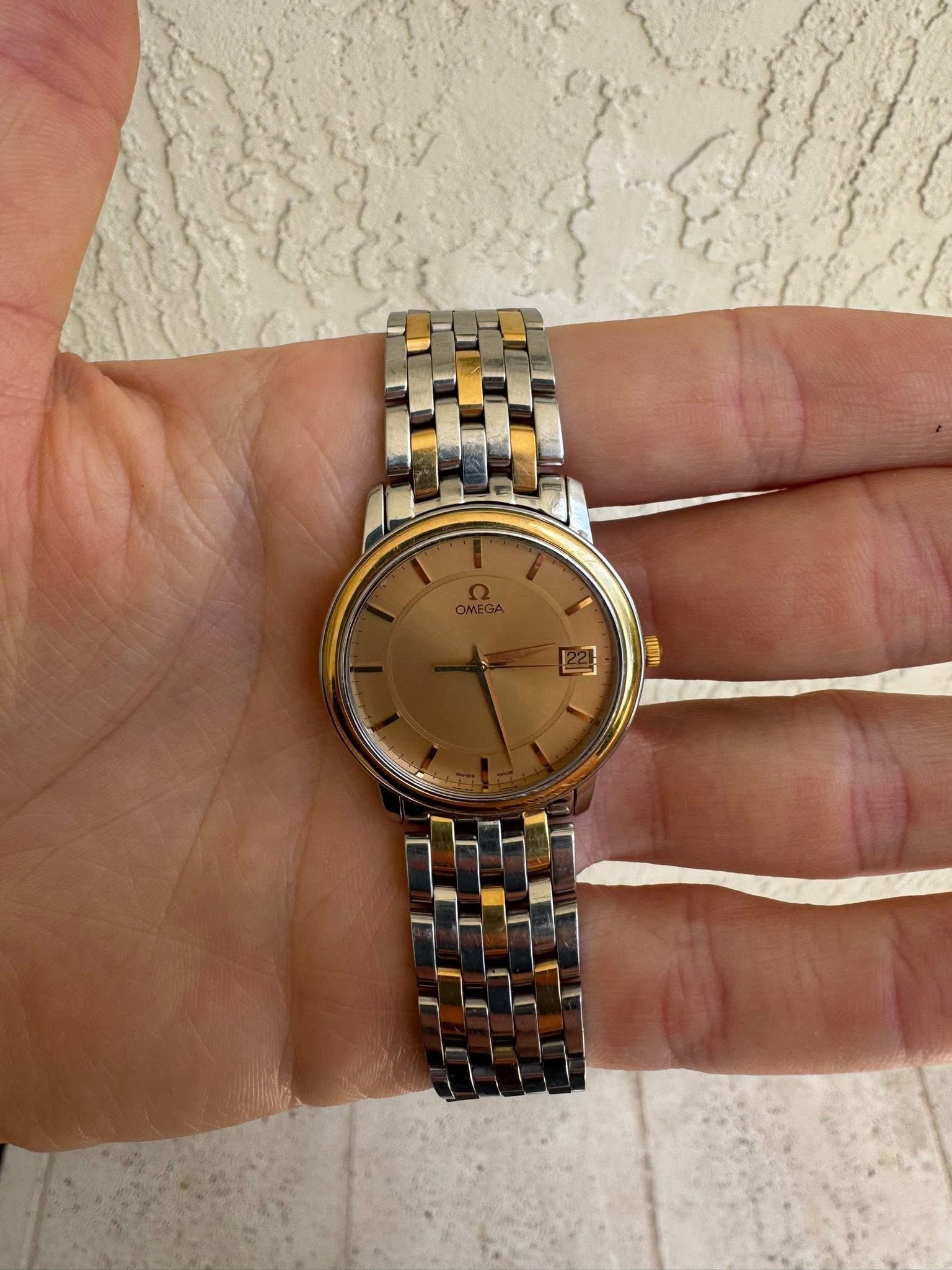 May be an image of wrist watch