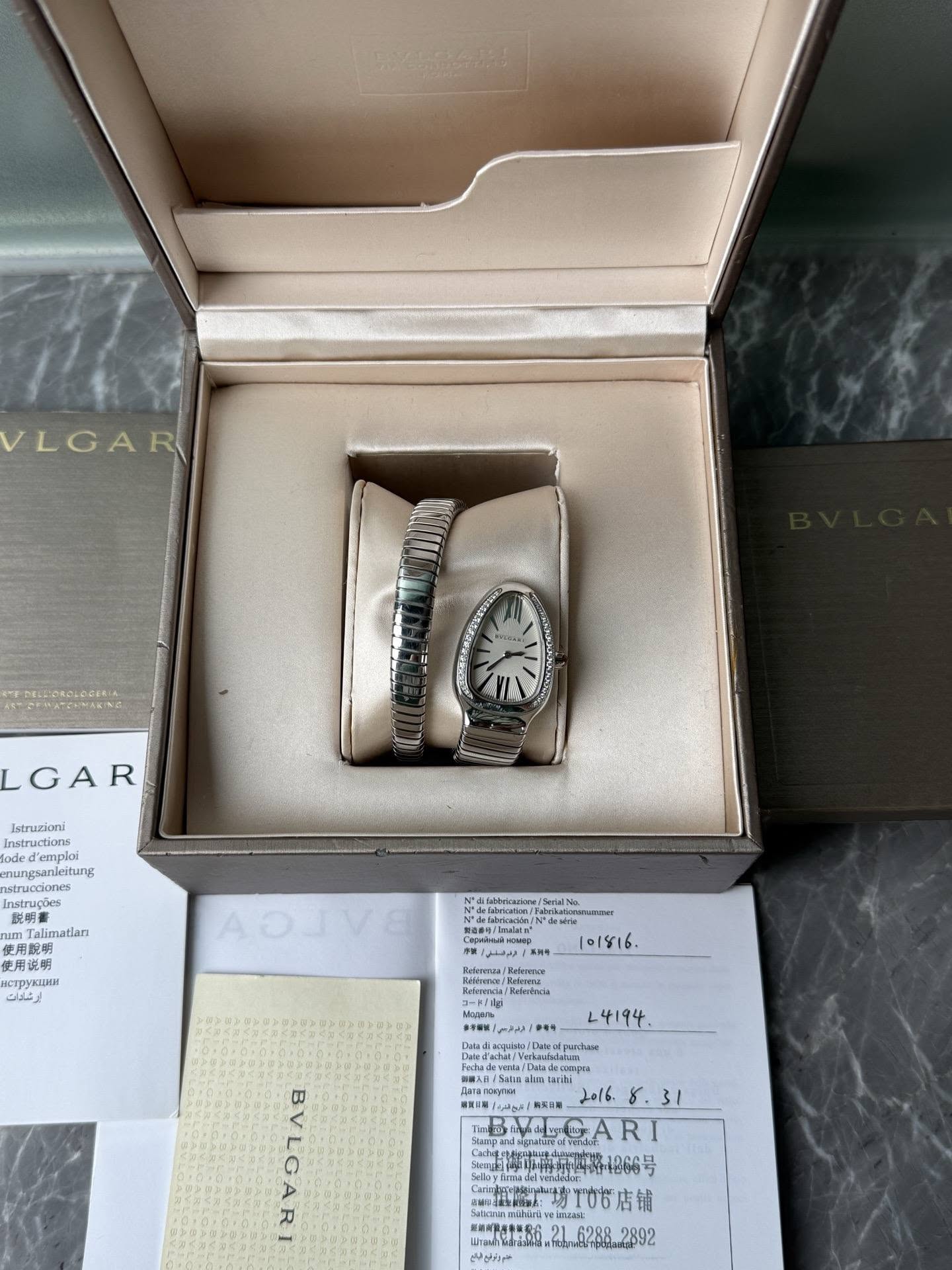 May be an image of wrist watch, jewelry and text