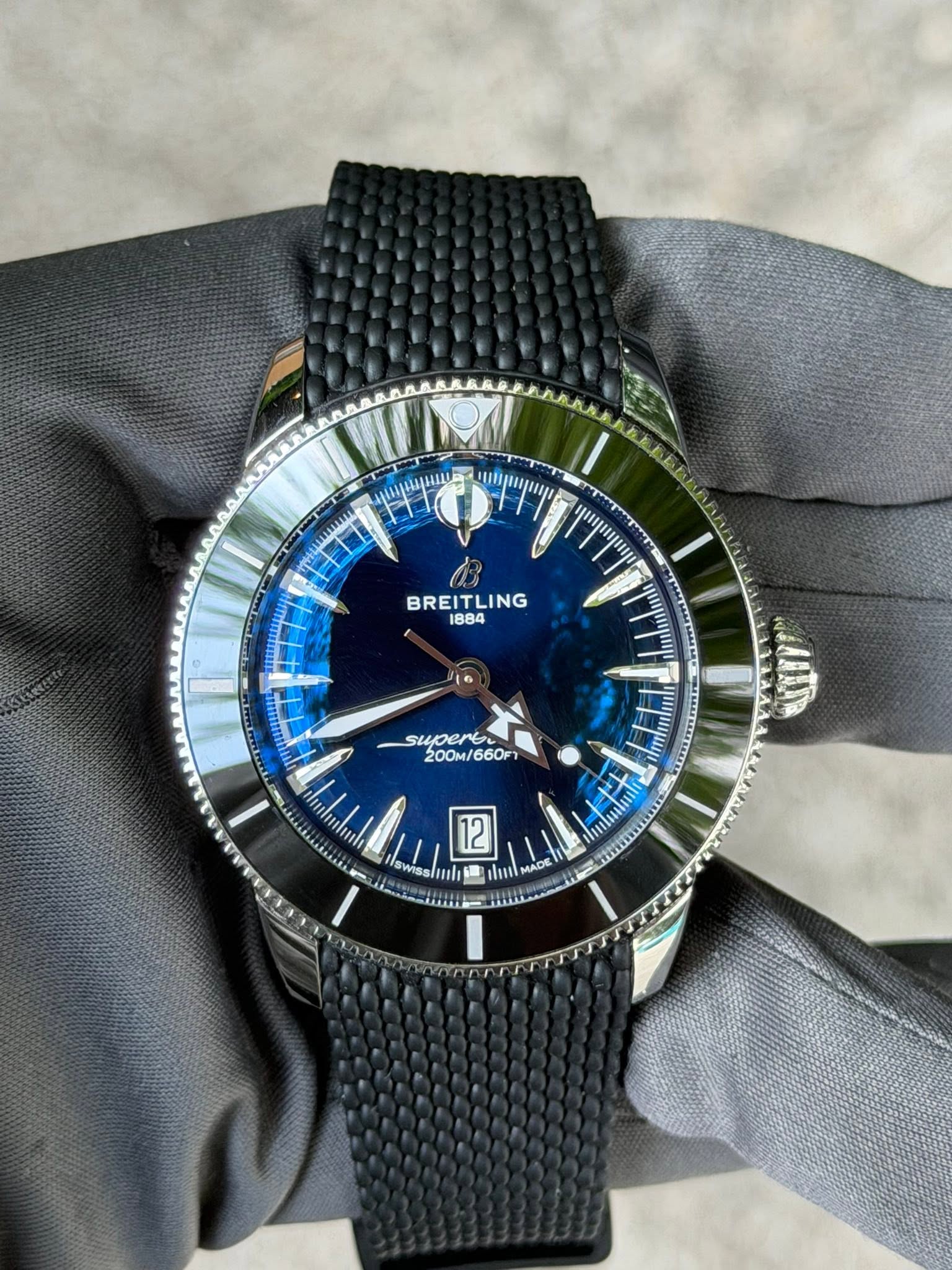 May be an image of wrist watch and text