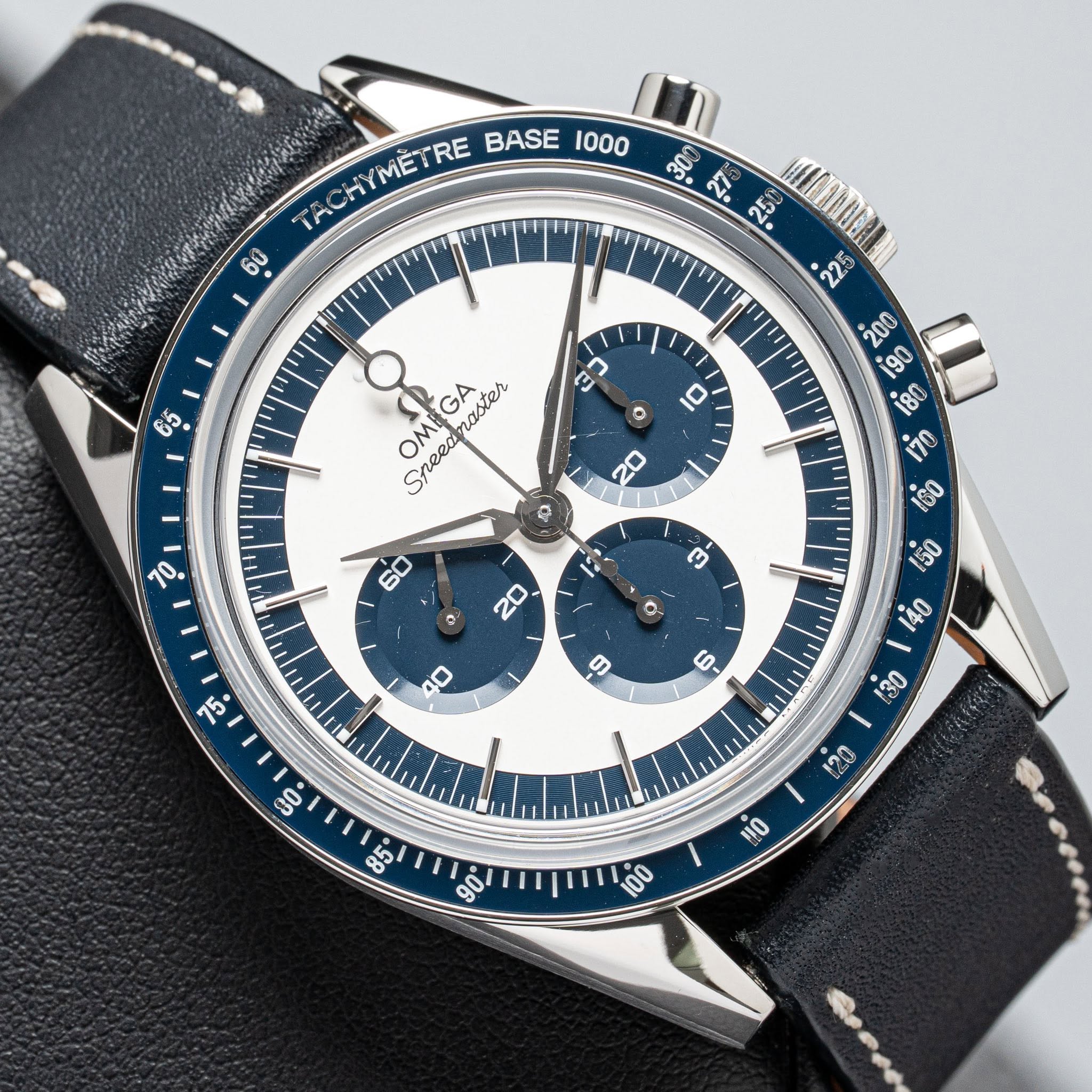 May be an image of wrist watch and text that says 'TACHIMETRE TACH METRE RE BASE . HHEANUGAN コ 0 OMI OM터 MIGA GA α Sn Speed ០ O. ம- HO 800 10'