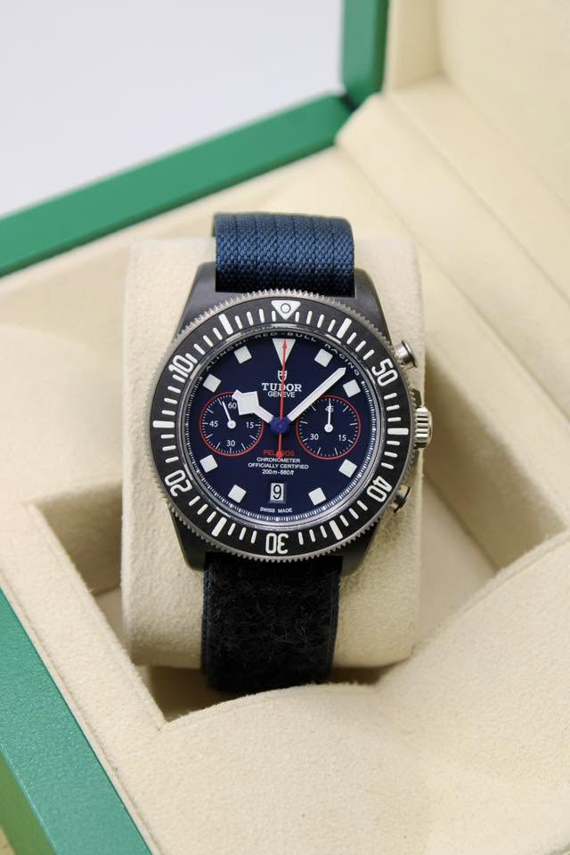 May be an image of wrist watch and text that says 'O 10 日 TUDOR TUI DOR - CHHONG OMETER 20 200m- 6 ENgTN 3 40 Ba MINIETE 30'