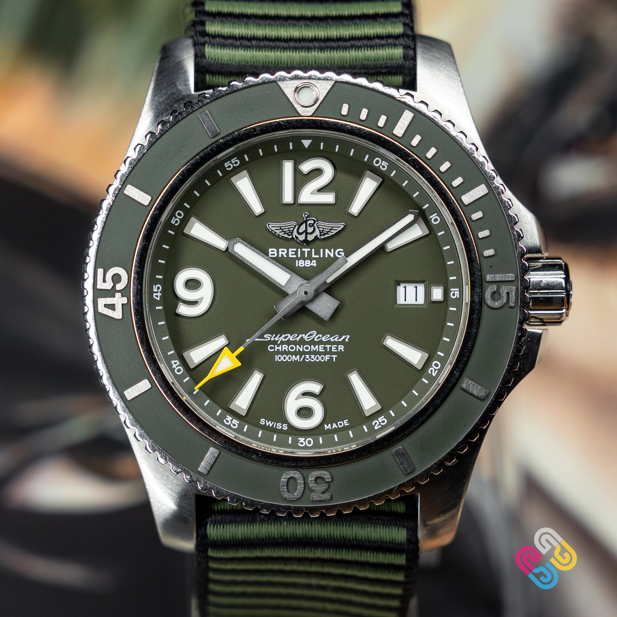 May be an image of wrist watch and text that says ' BREITLING LING BREITI A00LT 15 45 9 superEcean swper CHRONOMETER TER ot 分 / 1000M/330 1000M/ 000M/3300FT 3300F co 35 SWISS 6…