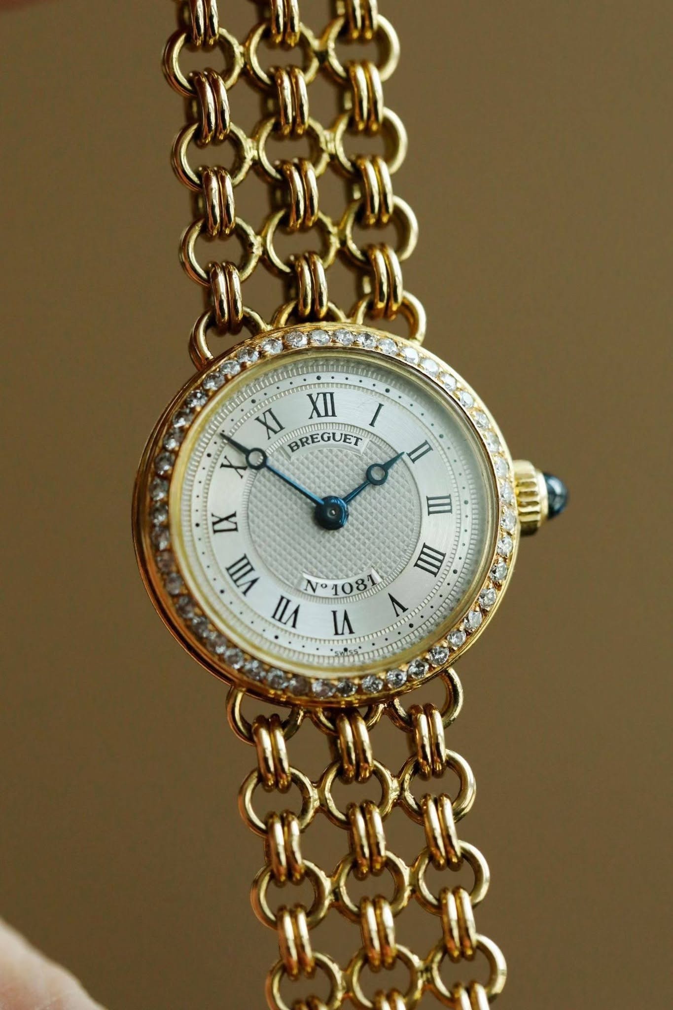 May be an image of wrist watch