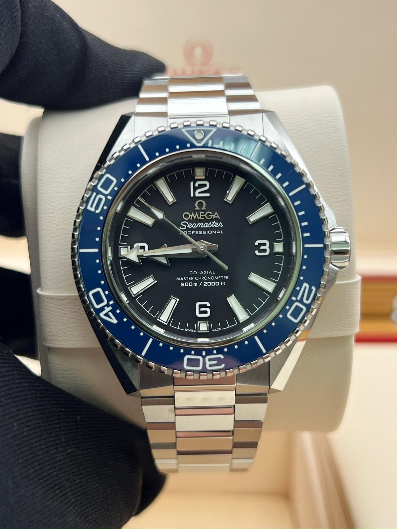 May be an image of wrist watch and text that says 'ب5 5 12 ח Seamaster Semelt OMEGA ROF COFESSI ISSIONAL ION ROFESSIONAL จ 3 ロ MASTER COCHPONOMETER 600m 2000ft ft I 6 أب 0 20…