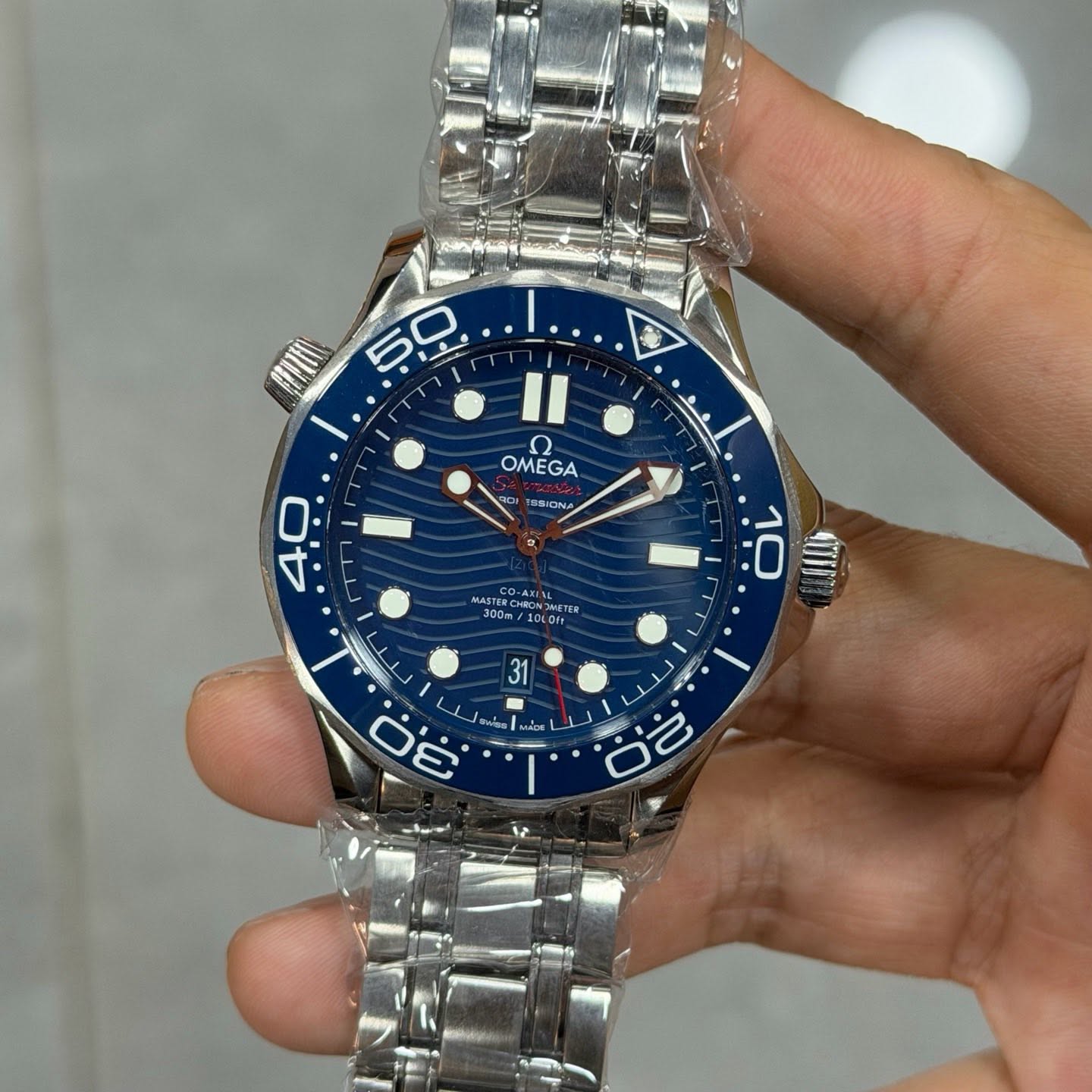 May be an image of wrist watch and text