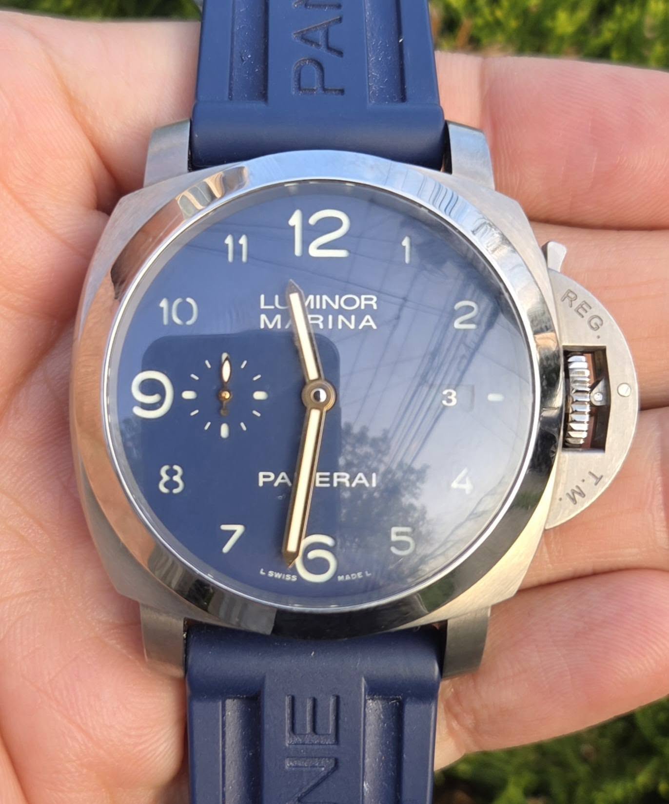 May be an image of wrist watch and text that says ' LU MINOR M RINA 焼バ 2 و 3 8 PAERAI PA ERAI REG. REG D ומיושות!! W W'T y 4 5 7 SWISS 6 MADEL'
