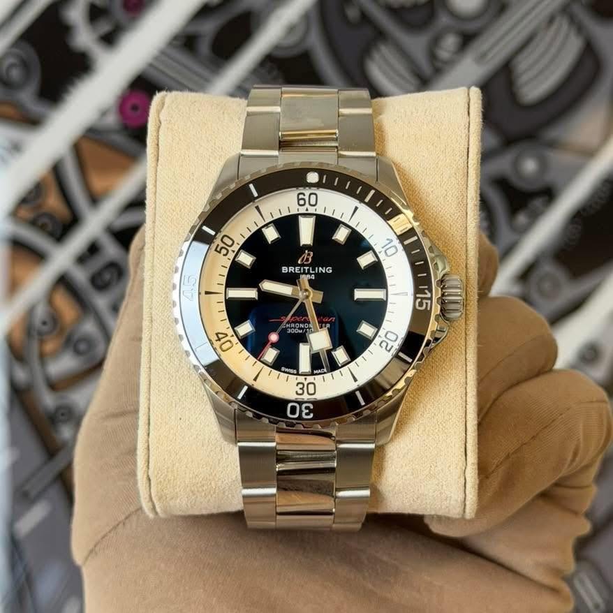 May be an image of wrist watch and text that says '60 50 BREITL BRE NG /1 15 40 O E 3 DE 30 I'