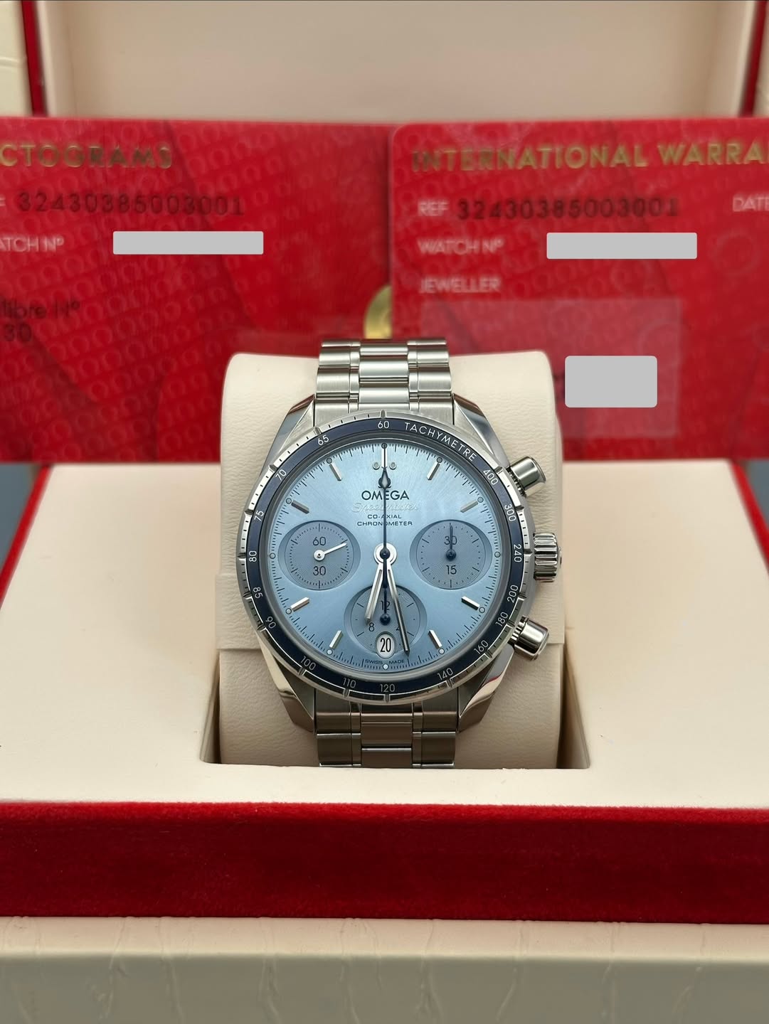 May be an image of wrist watch and text that says 'TOORAMO TCHNP INTERNATIONAL WARRA WATCH WATCHINP DAT JEWELLER 65 70 TACHYMETRE OMEGA cO--K CHEM WETER 60 o 30 40 መምስ 面 ២4 15 20'