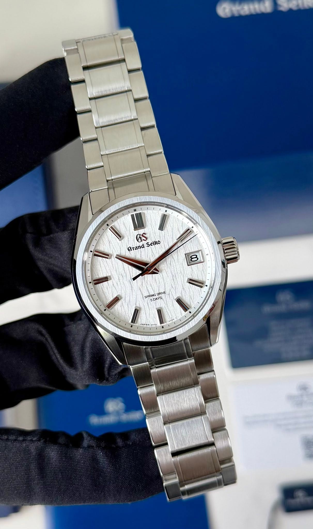 May be an image of wrist watch and text