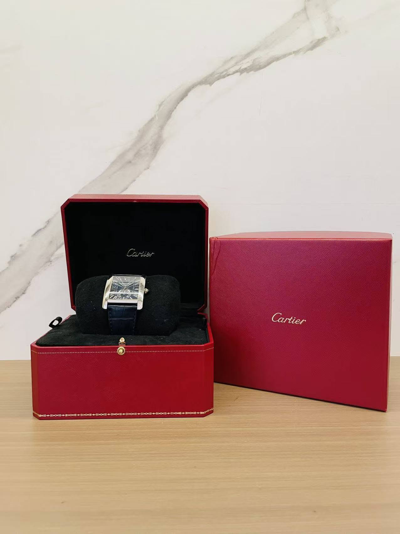 May be an image of cufflinks, wrist watch, ring and text