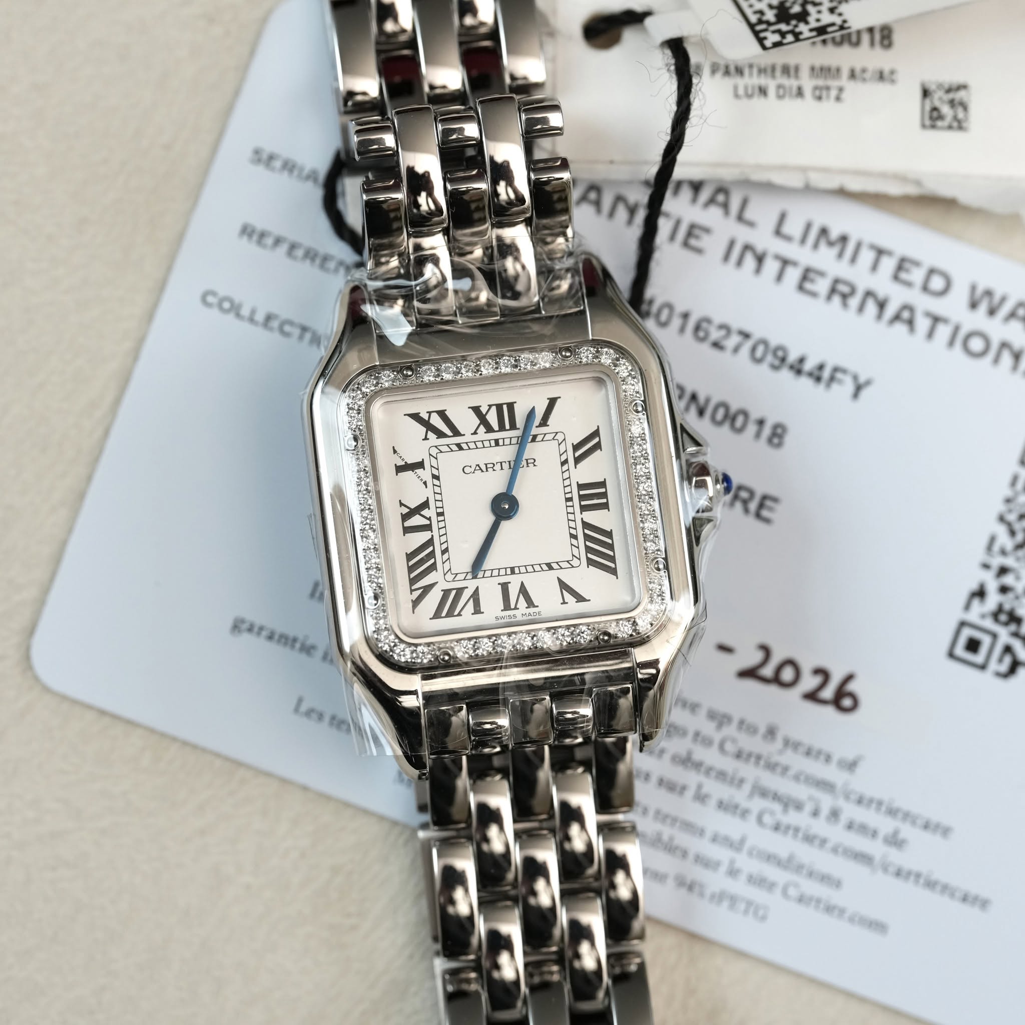 May be an image of wrist watch and text