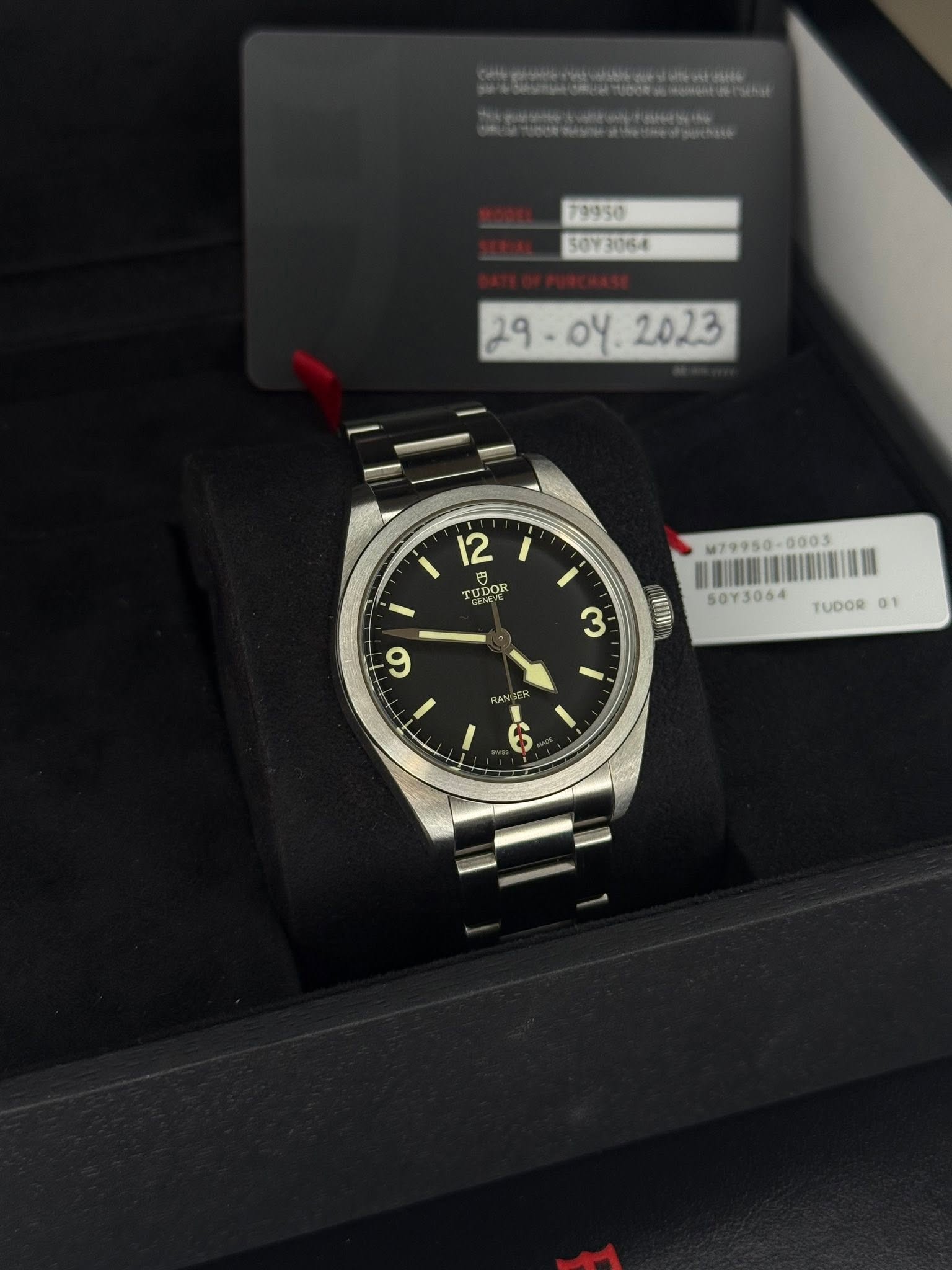 May be an image of wrist watch and text