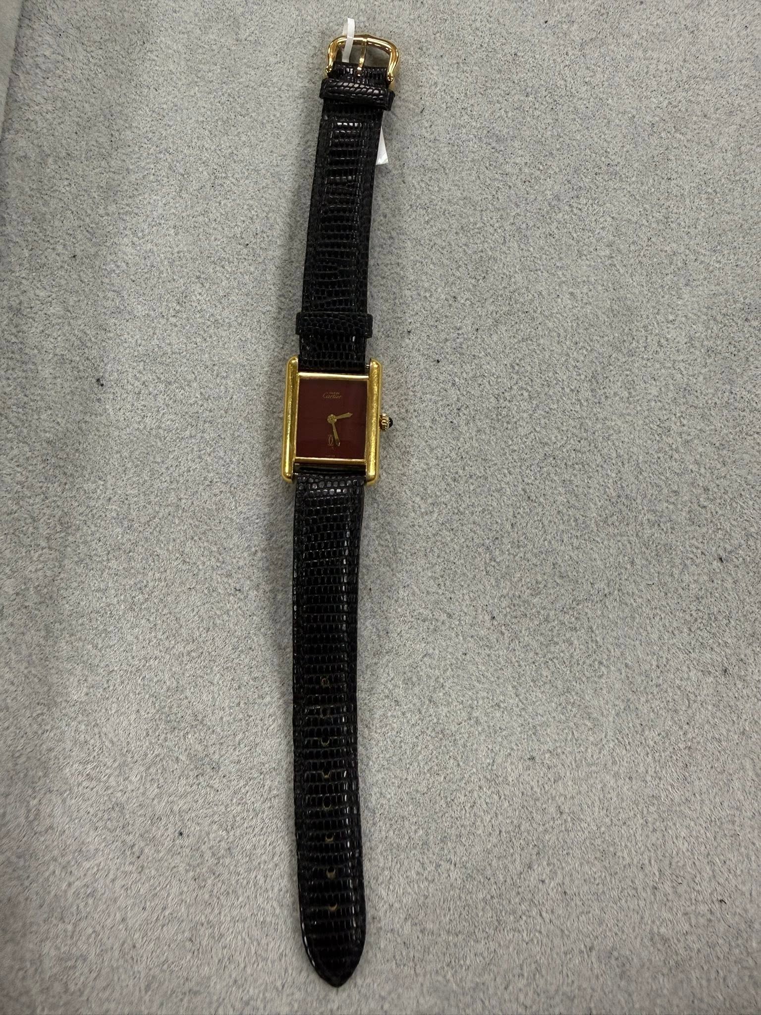 May be an image of leather and wrist watch