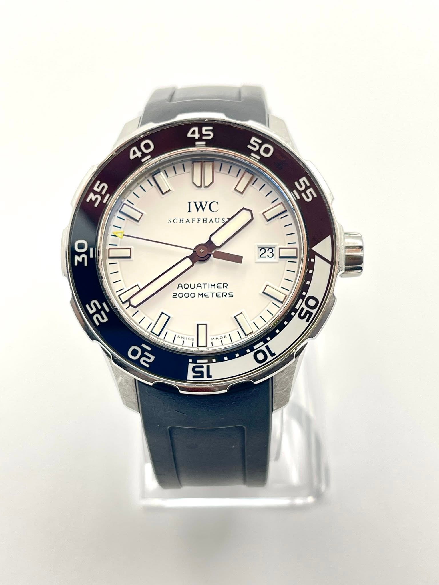 May be an image of wrist watch and text that says ' α' U IWC SCHAFFHAUS SCHAFFHAUS 55 5 30 D' 23 DI ימו AQUATIMER 2000METERS 2000 METERS 25 O ل 20 15 O 05'